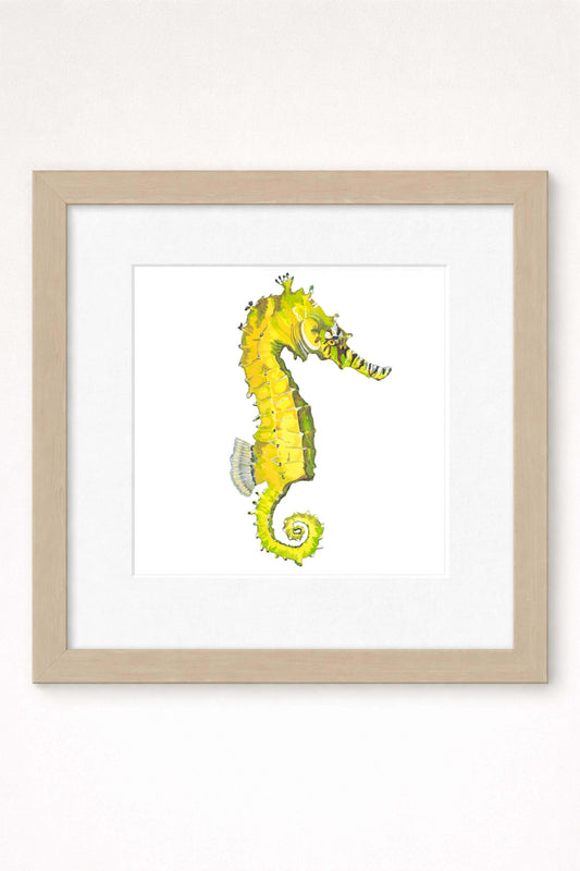 giclee print of watercolor painting of yellow seahorse by emily bourassa in brown frame