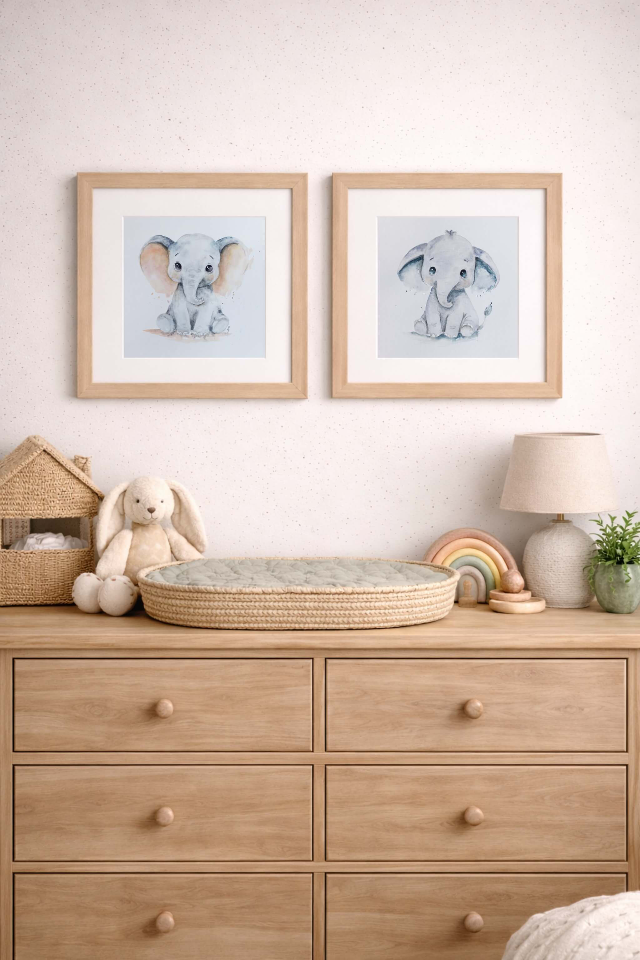 little trunks of love collection featuring a blue and pink elephant by lisa naomi