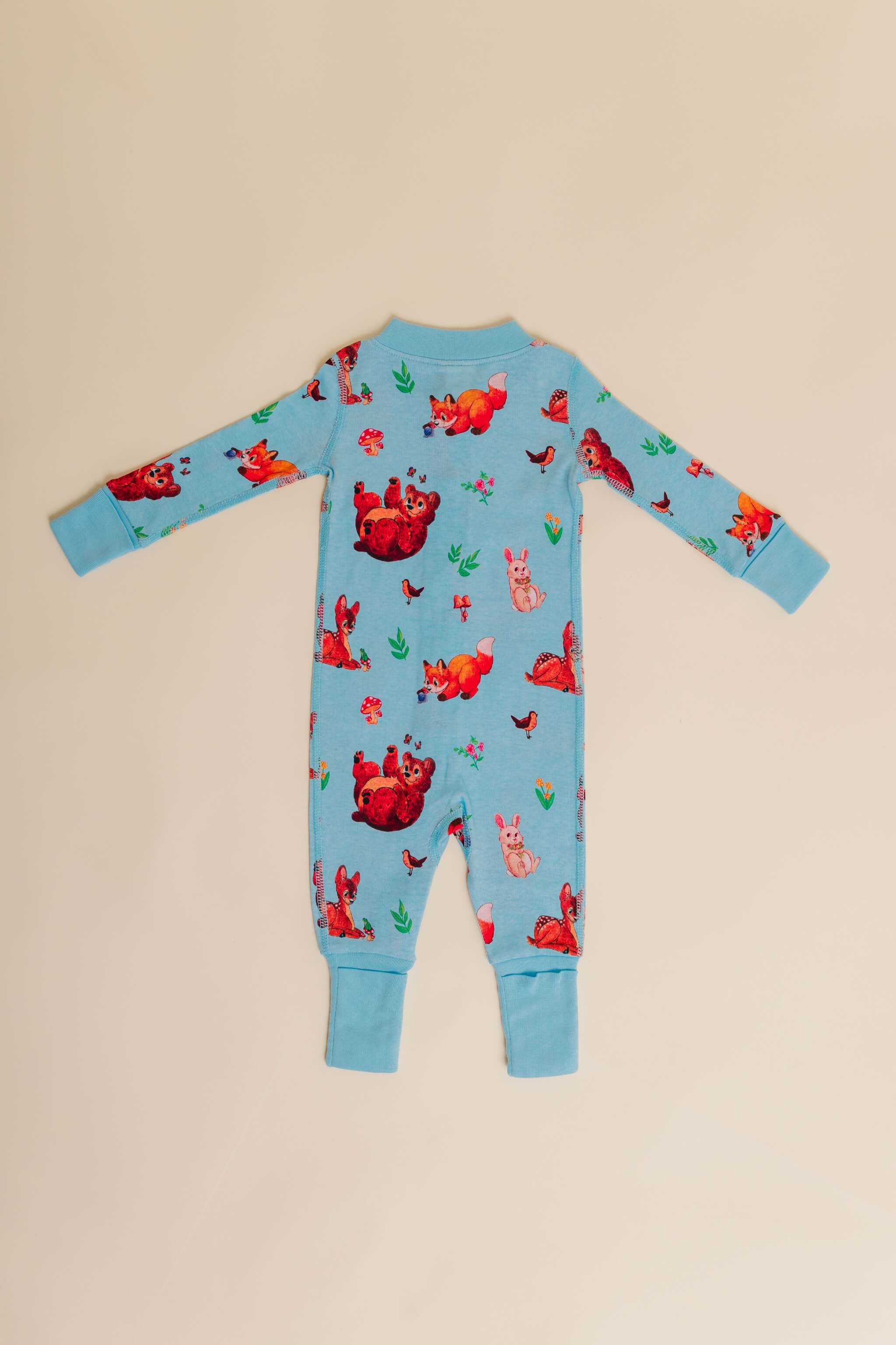 organic cotton baby zipper sleeper with fold-over cuffs in blue animal print designed by anna iwin