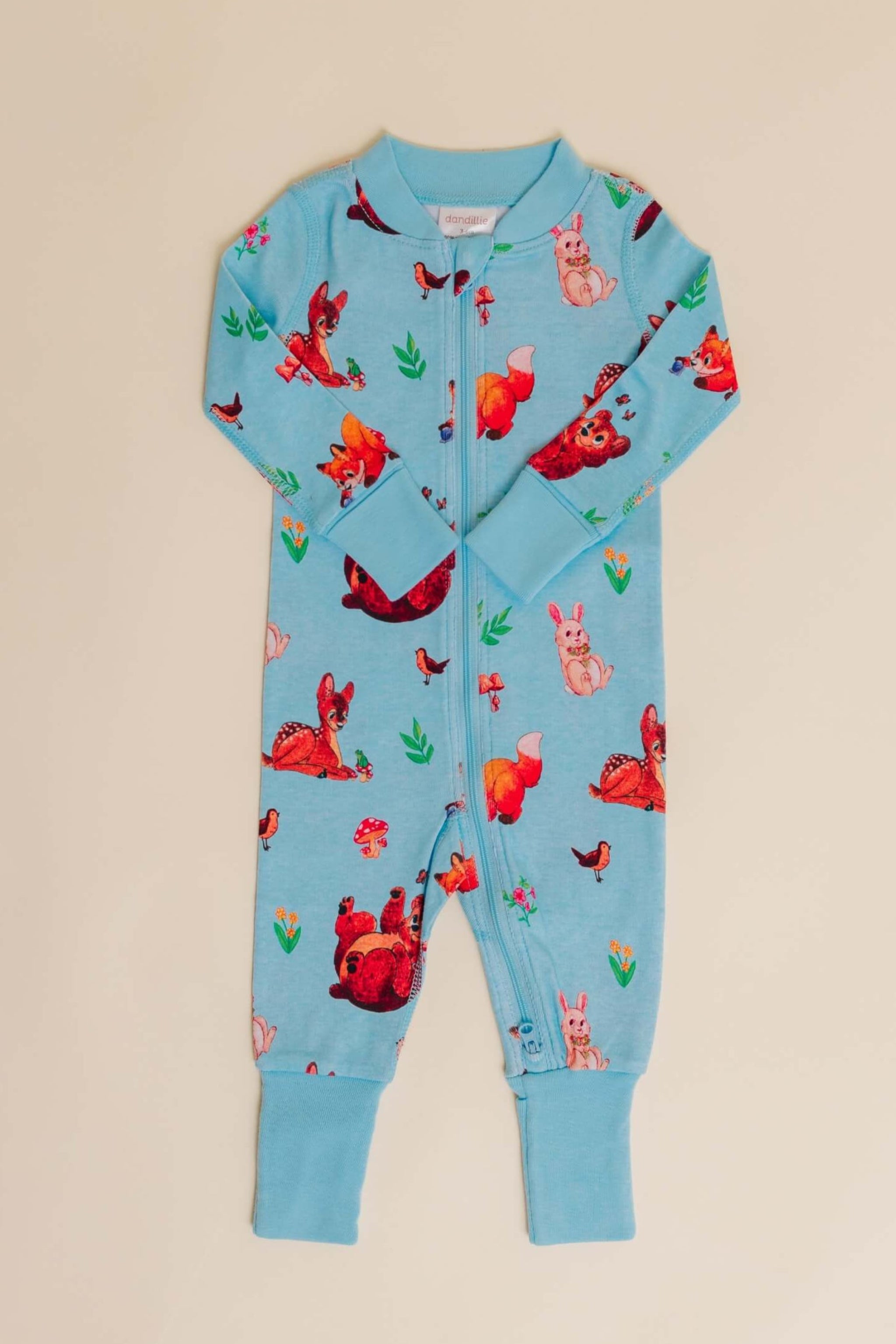 organic cotton baby zipper sleeper with fold-over cuffs in blue animal print designed by anna iwin