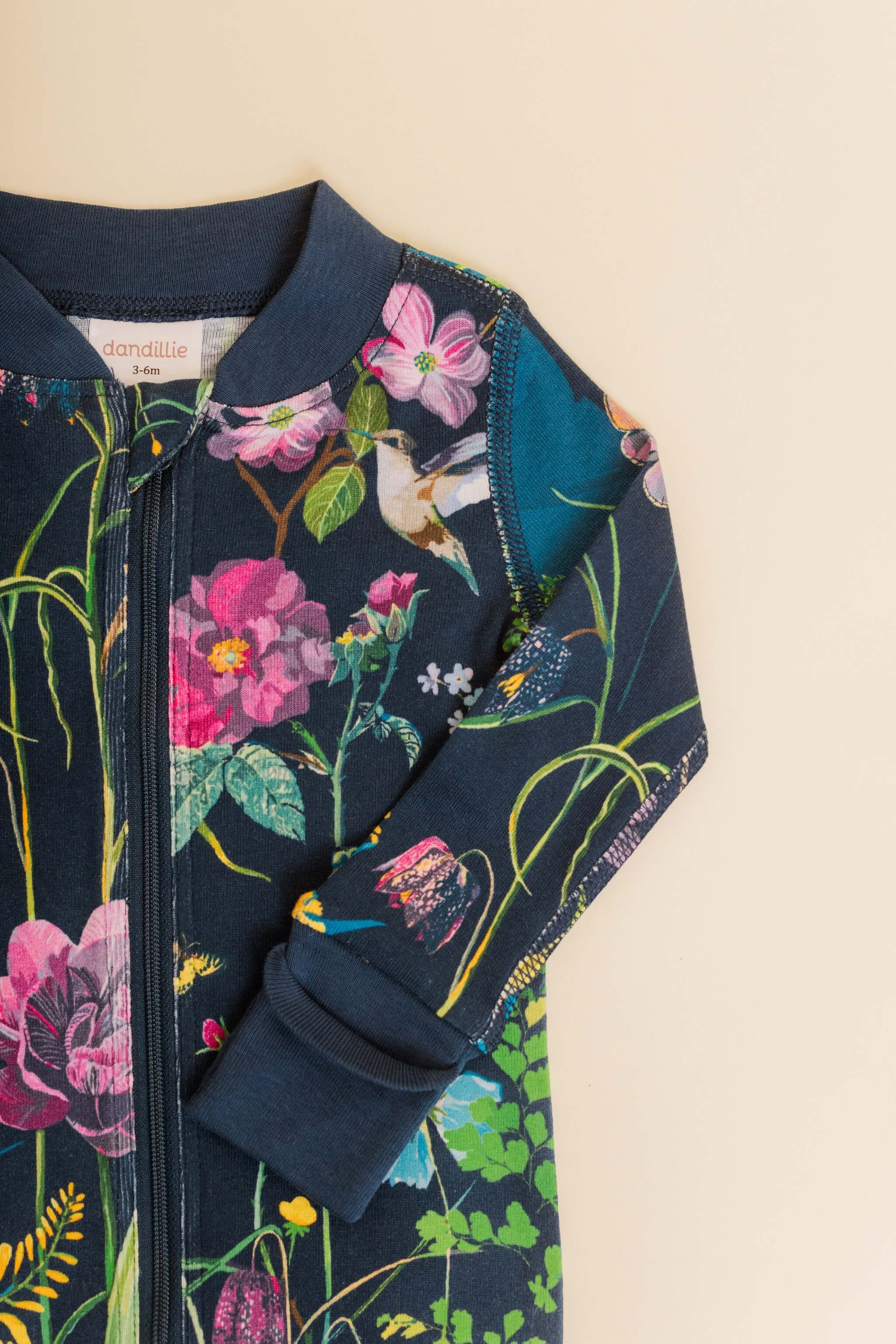 organic cotton baby zipper sleeper with fold-over cuffs in blue floral print designed by julia whitney barnes