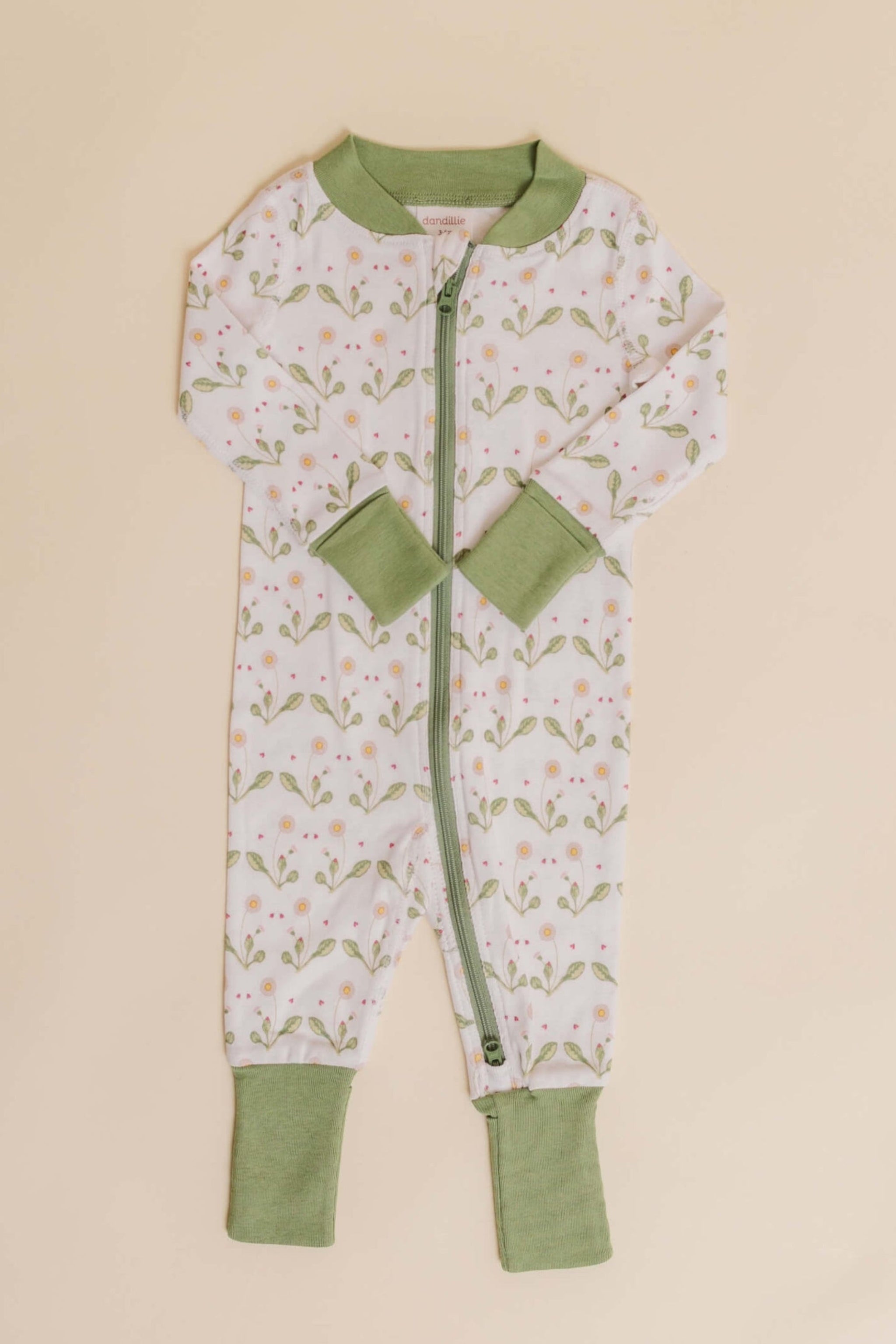organic cotton baby zipper sleeper with fold-over cuffs in green daisy print designed by giacomina ferrillo