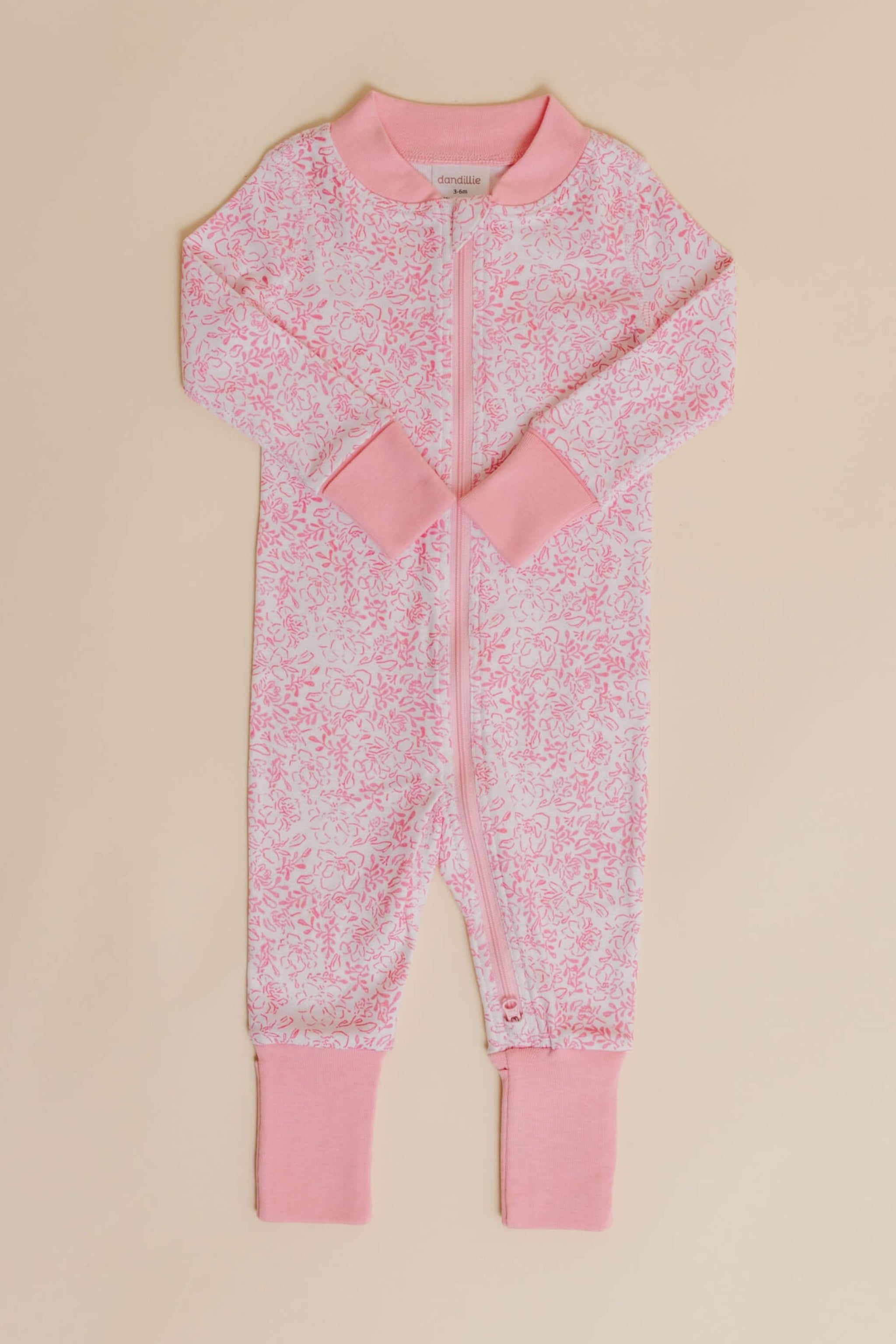 organic cotton baby zipper sleeper with fold-over cuffs in pink floral print designed by eliza baucom