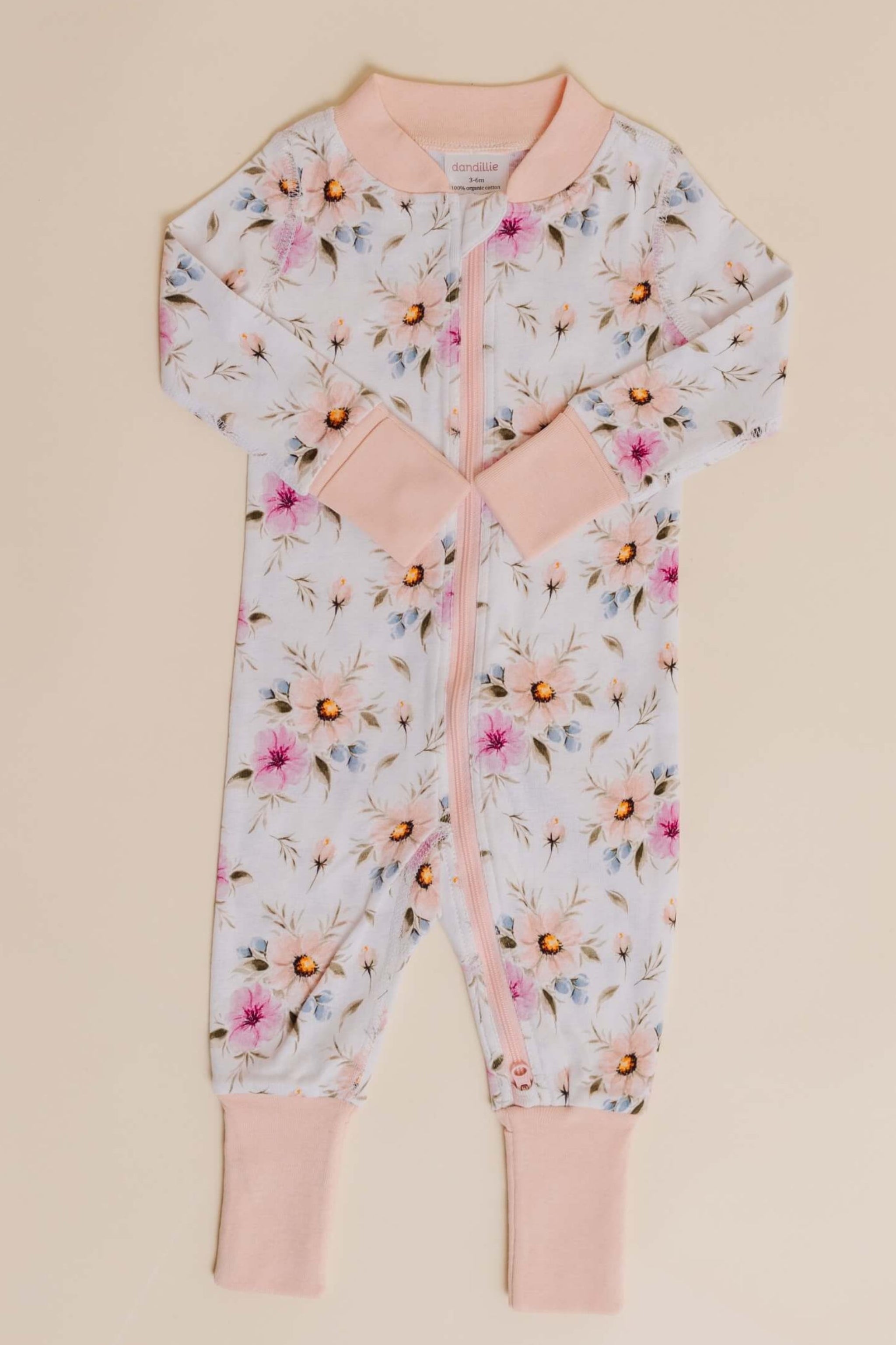 organic cotton baby zipper sleeper with fold-over cuffs in coral floral print designed by jen sweeney