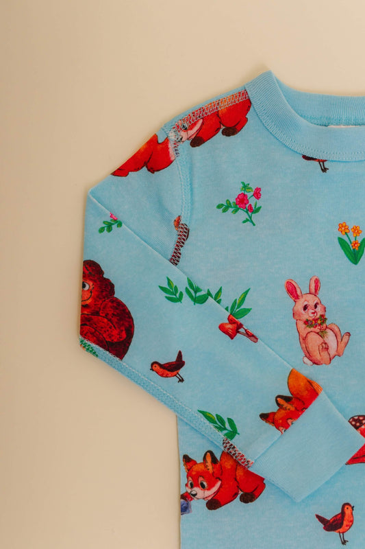 organic cotton children's long sleeve sleepwear in blue animal print designed by anna iwin