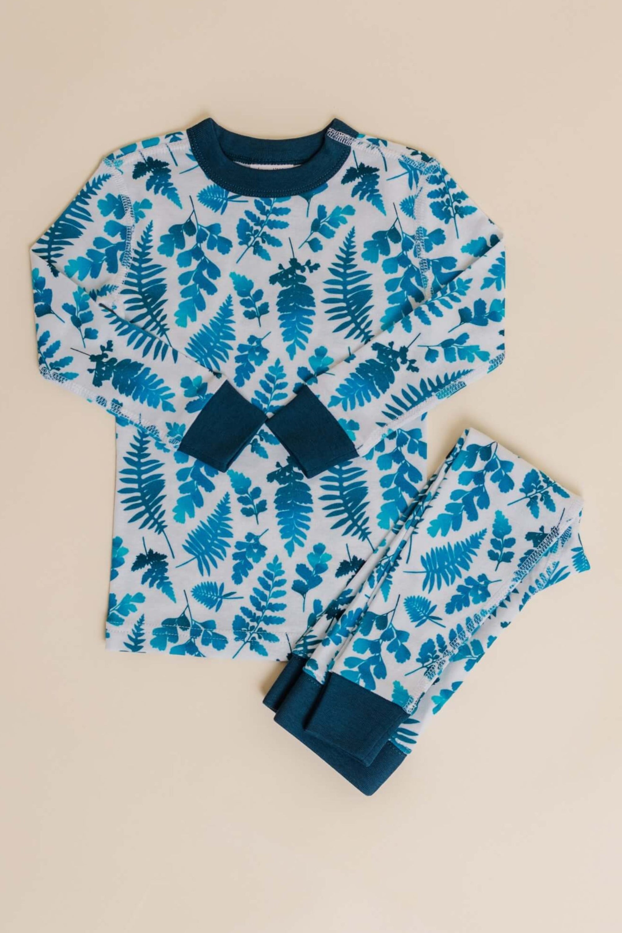 organic cotton children's long sleeve sleepwear in blue fern print designed by jen johnston