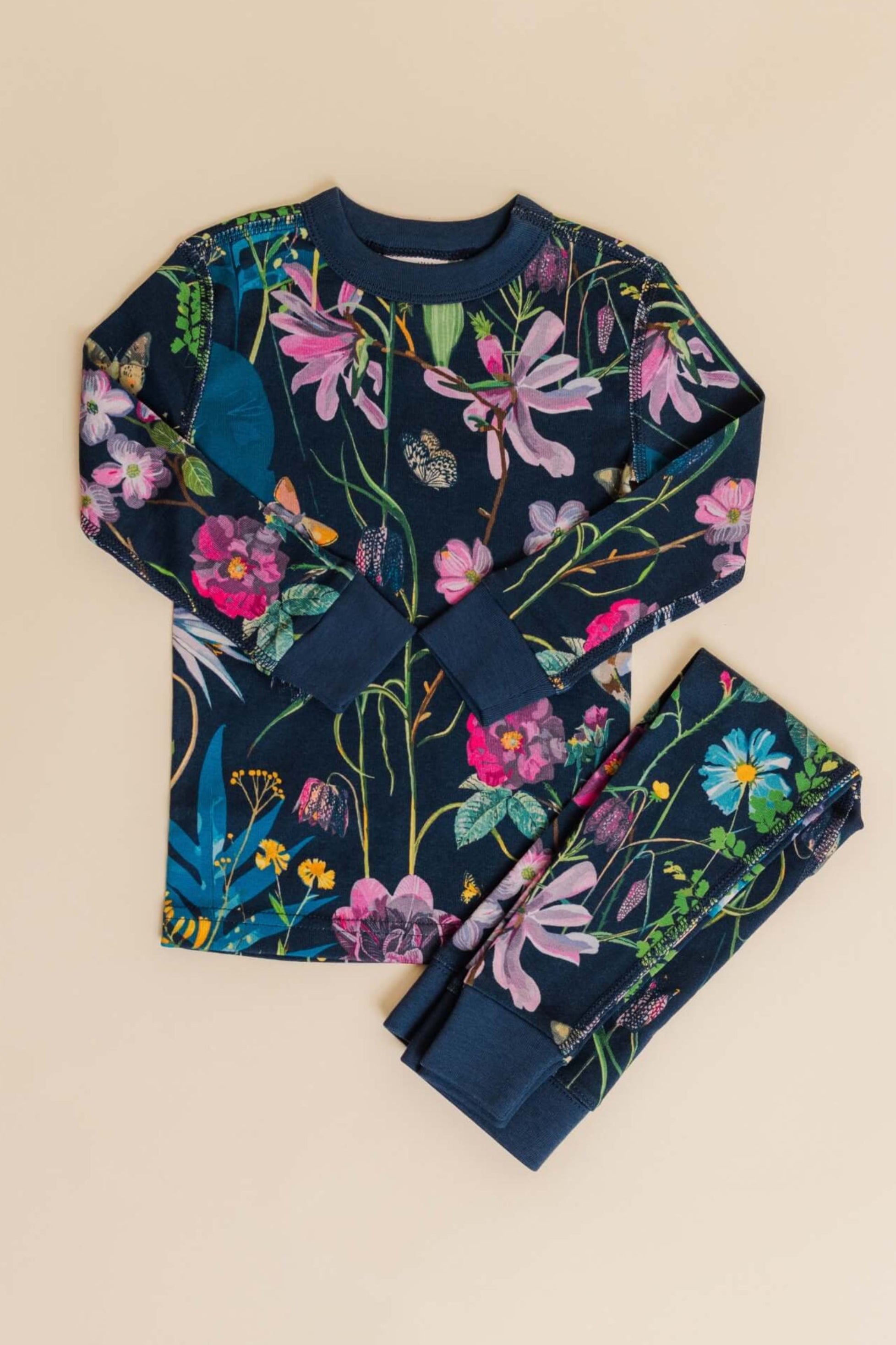 organic cotton children's long sleeve sleepwear in blue floral print designed by julia whitney barnes