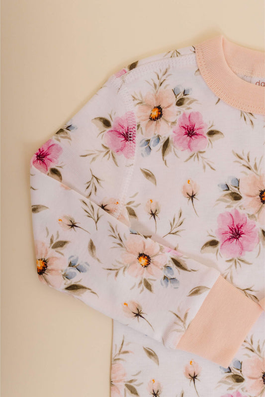 organic cotton children's long sleeve sleepwear in coral floral print designed by jen sweeeney