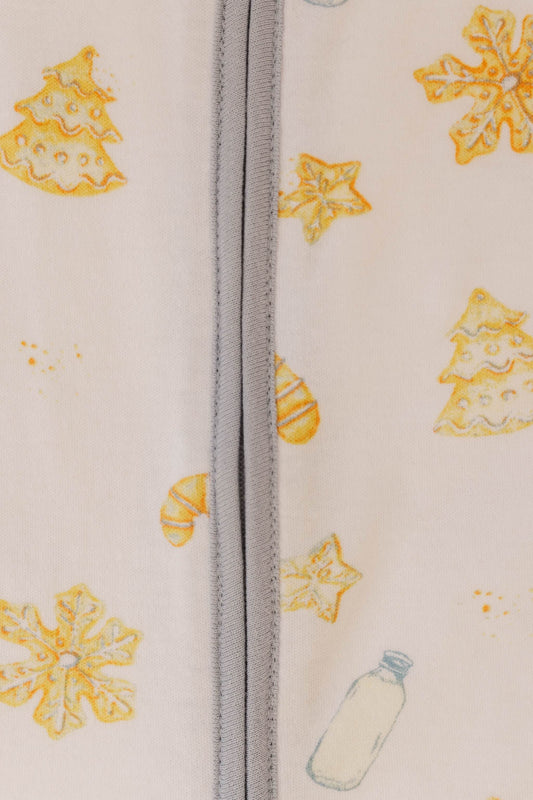 organic sleeper with milk and cookies design hand drawn by Taddy Mikelaites