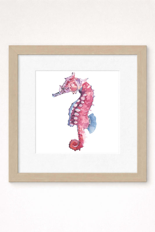 giclee print of watercolor painting of pink seahorse by emily bourassa in brown frame