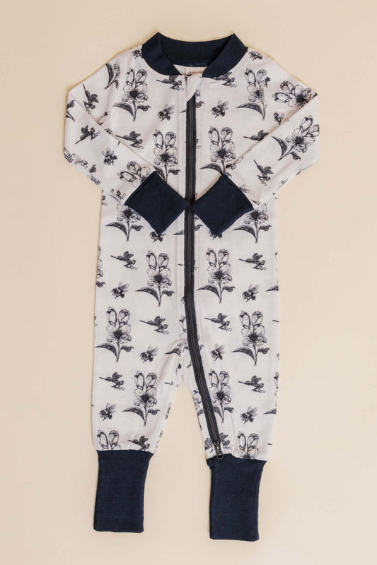 organic cotton baby zipper sleeper with fold-over cuffs in black ink print designed by chewie co