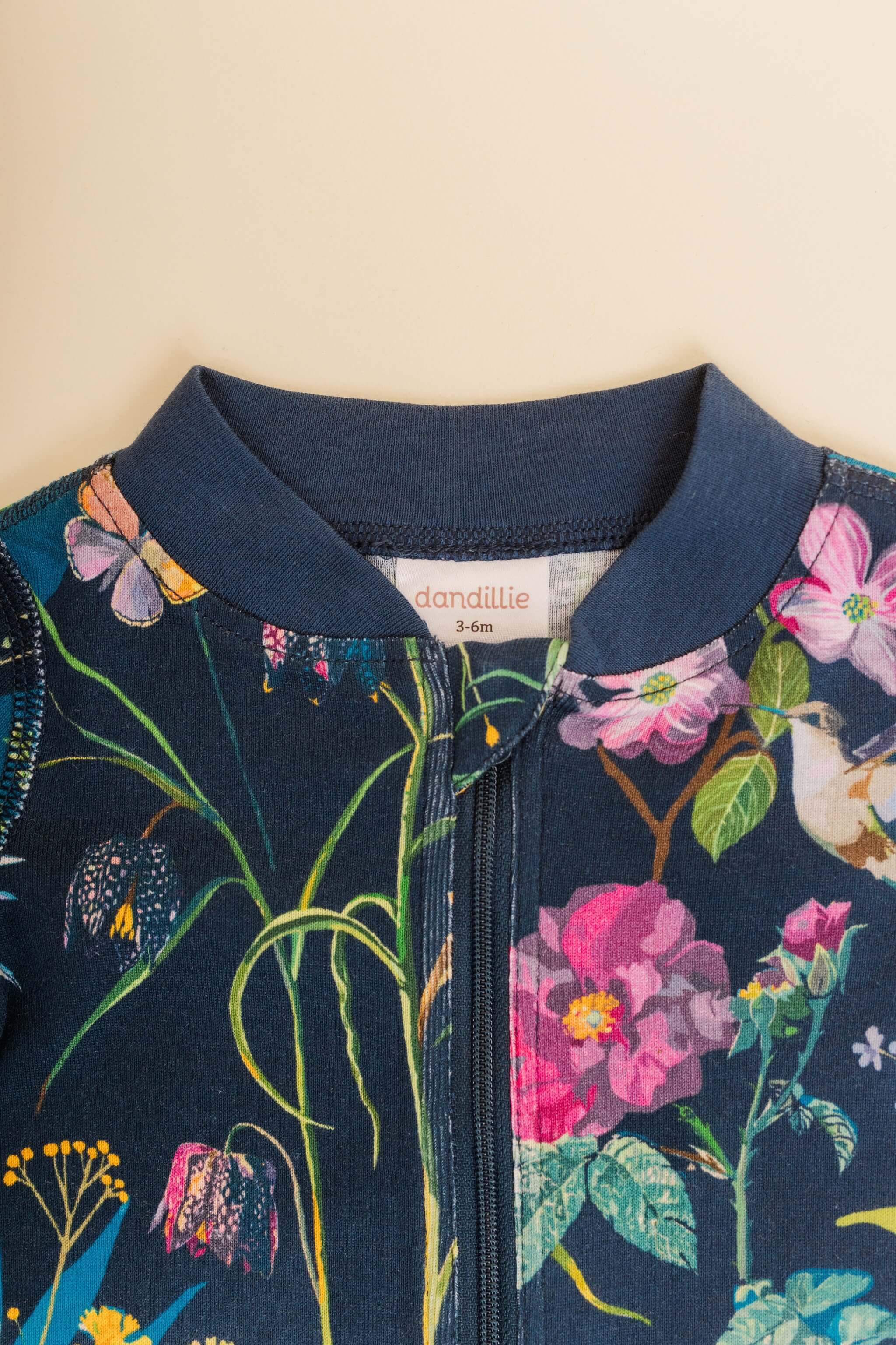 organic cotton baby zipper sleeper with fold-over cuffs in blue floral print designed by julia whitney barnes