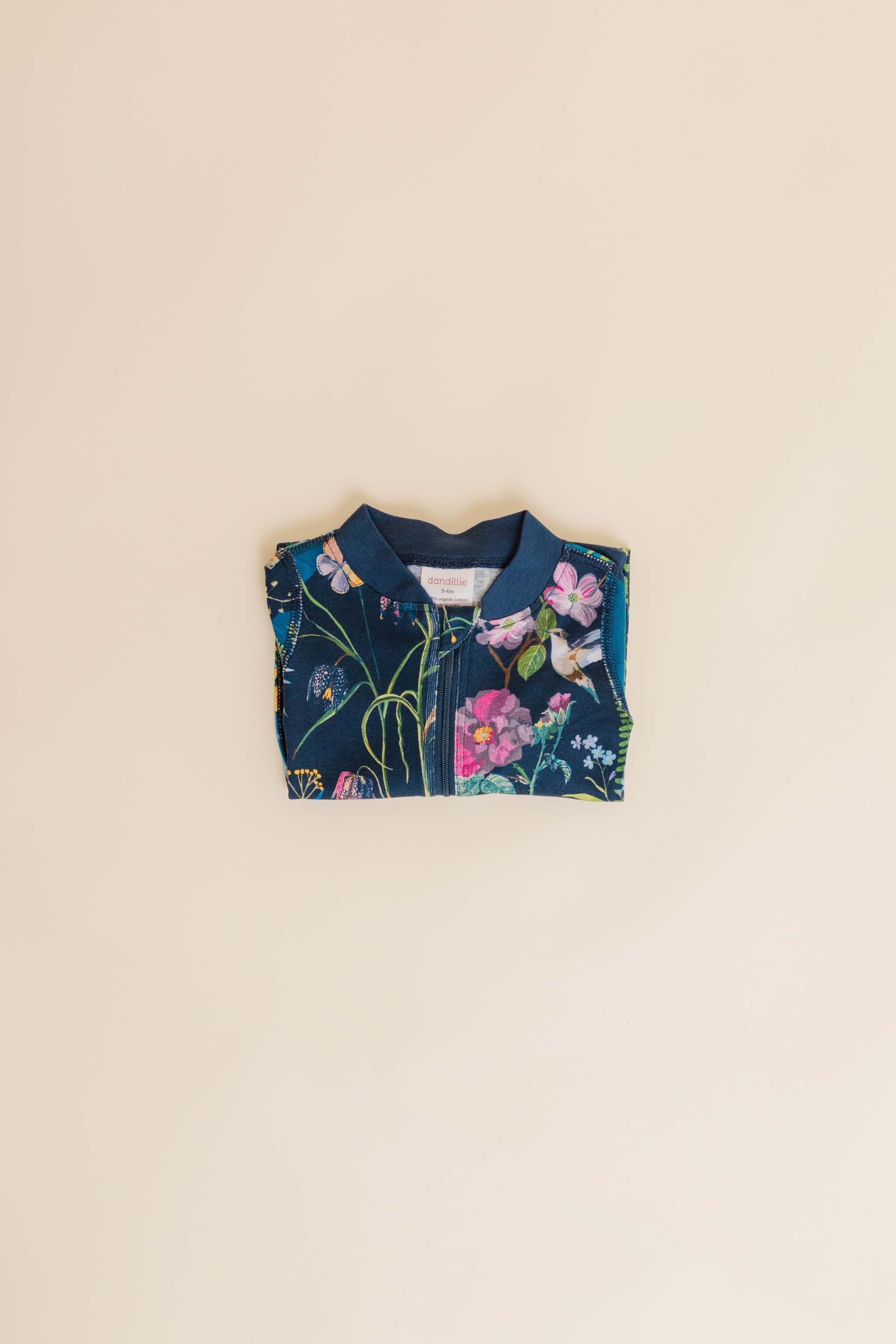 organic cotton baby zipper sleeper with fold-over cuffs in blue floral print designed by julia whitney barnes