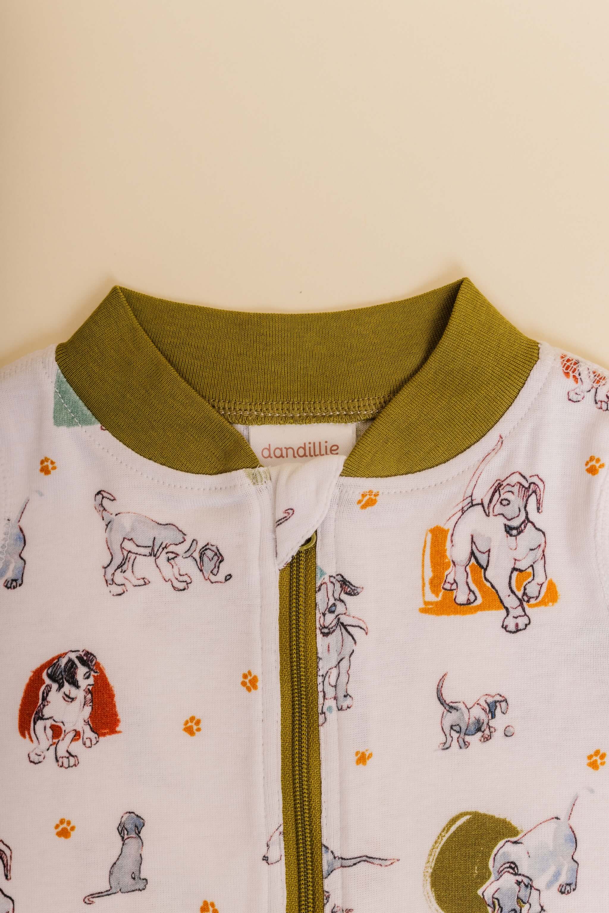 organic cotton baby zipper sleeper with fold-over cuffs in green puppy print designed by jen brandon