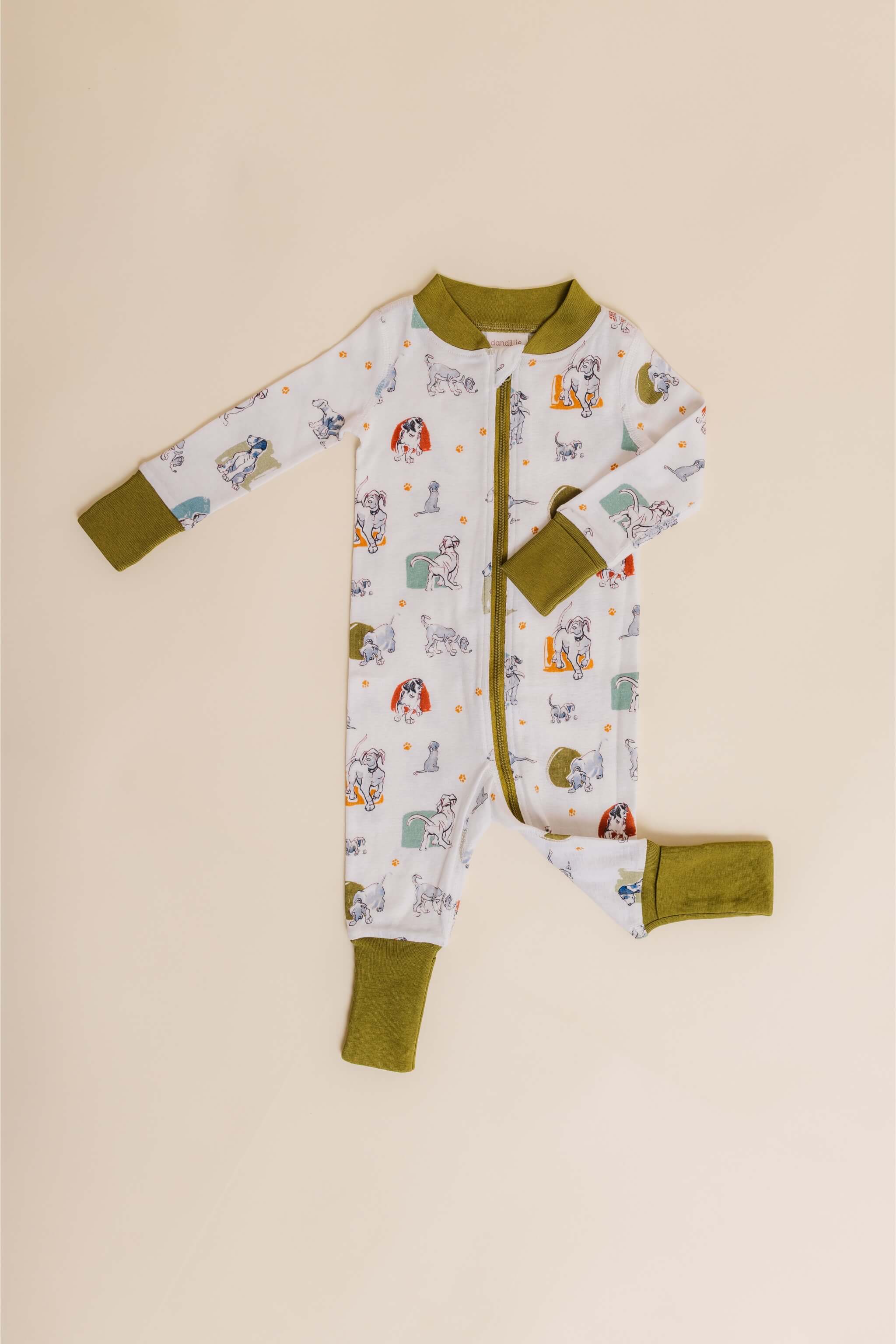 organic cotton baby zipper sleeper with fold-over cuffs in green puppy print designed by jen brandon