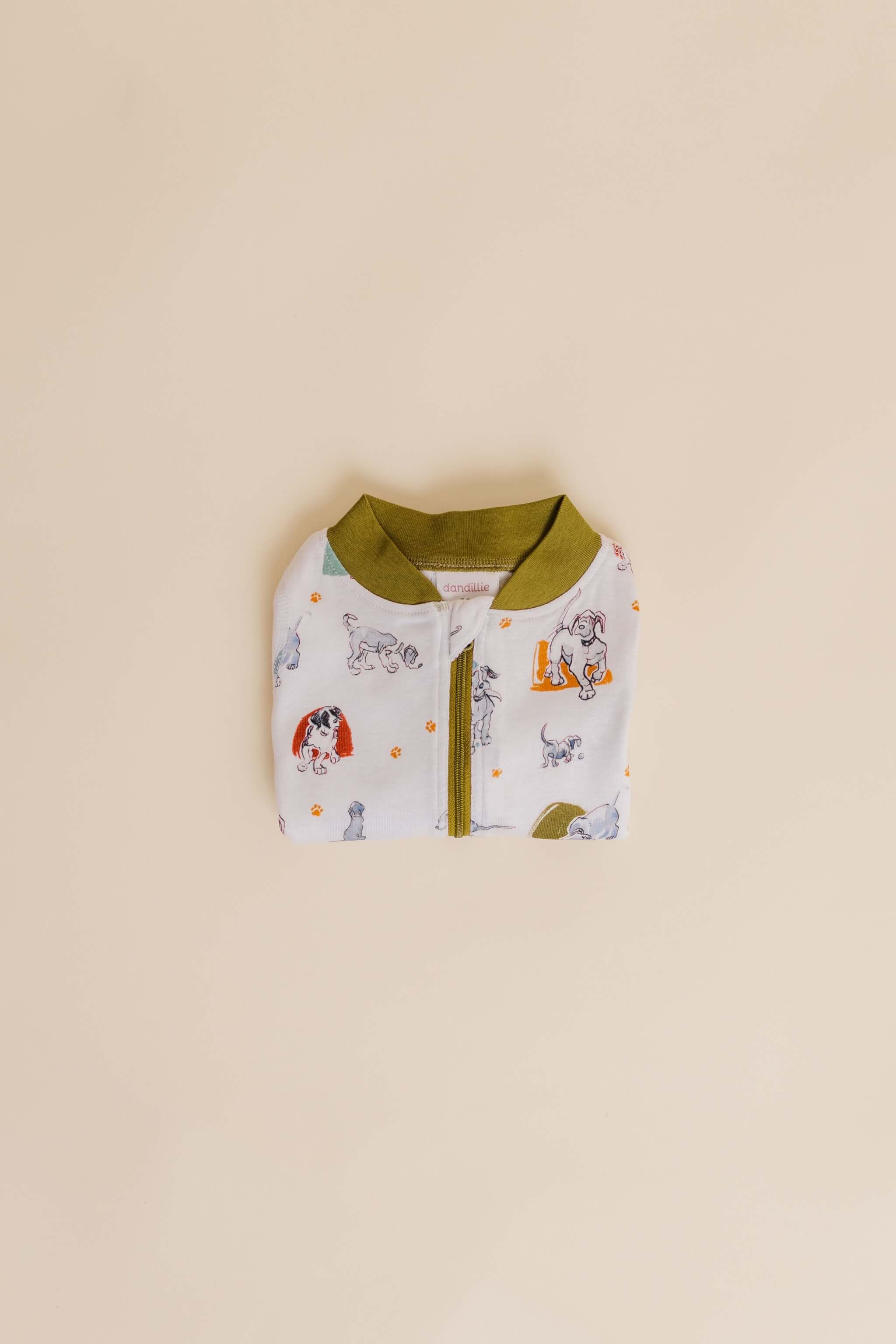 organic cotton baby zipper sleeper with fold-over cuffs in green puppy print designed by jen brandon