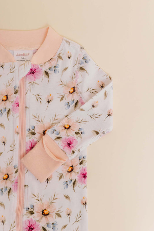 organic cotton baby zipper sleeper with fold-over cuffs in coral floral print designed by jen sweeney
