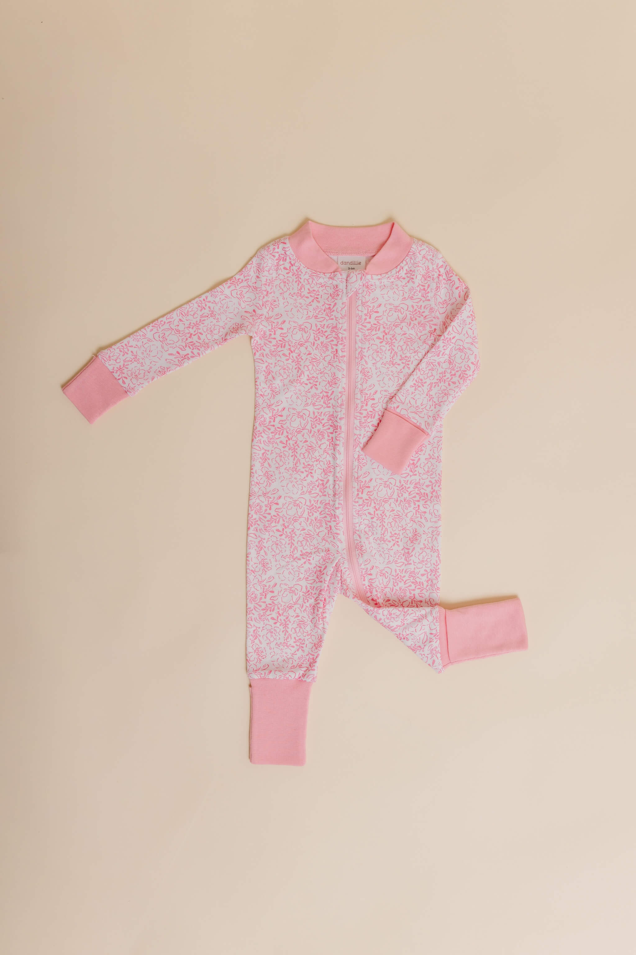 organic cotton baby zipper sleeper with fold-over cuffs in pink floral print designed by eliza baucom