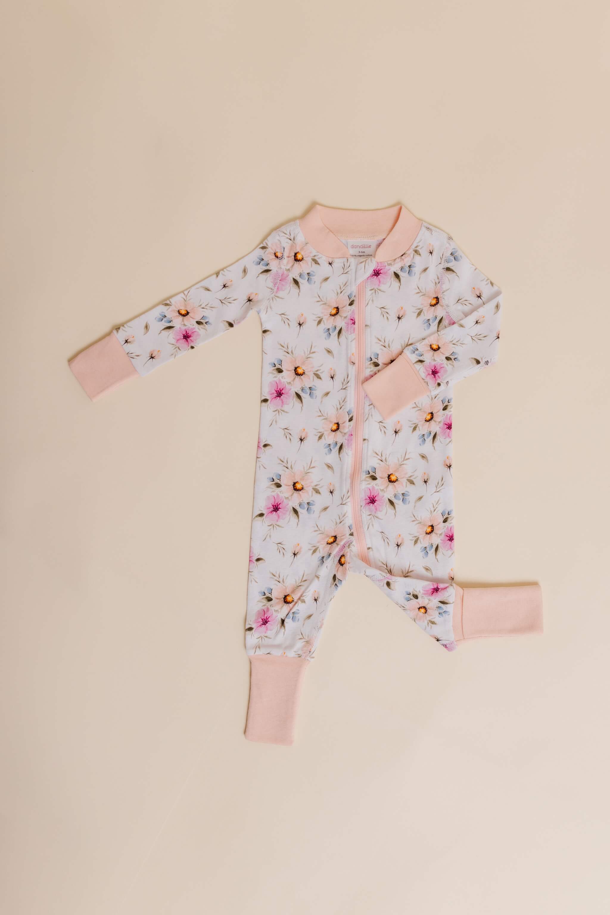 organic cotton baby zipper sleeper with fold-over cuffs in coral floral print designed by jen sweeney
