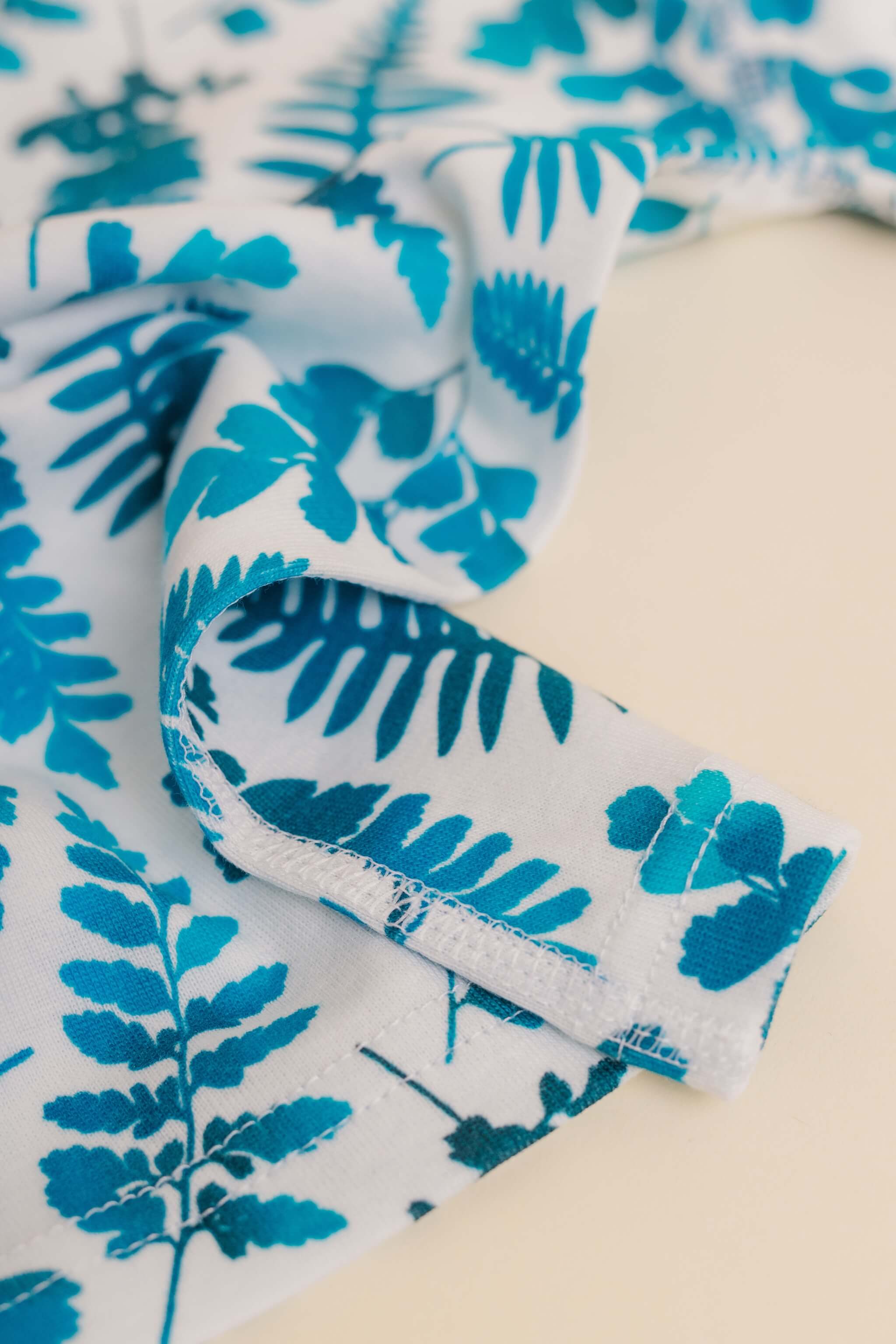 organic cotton children's long sleeve sleepwear in blue fern print designed by jen johnston