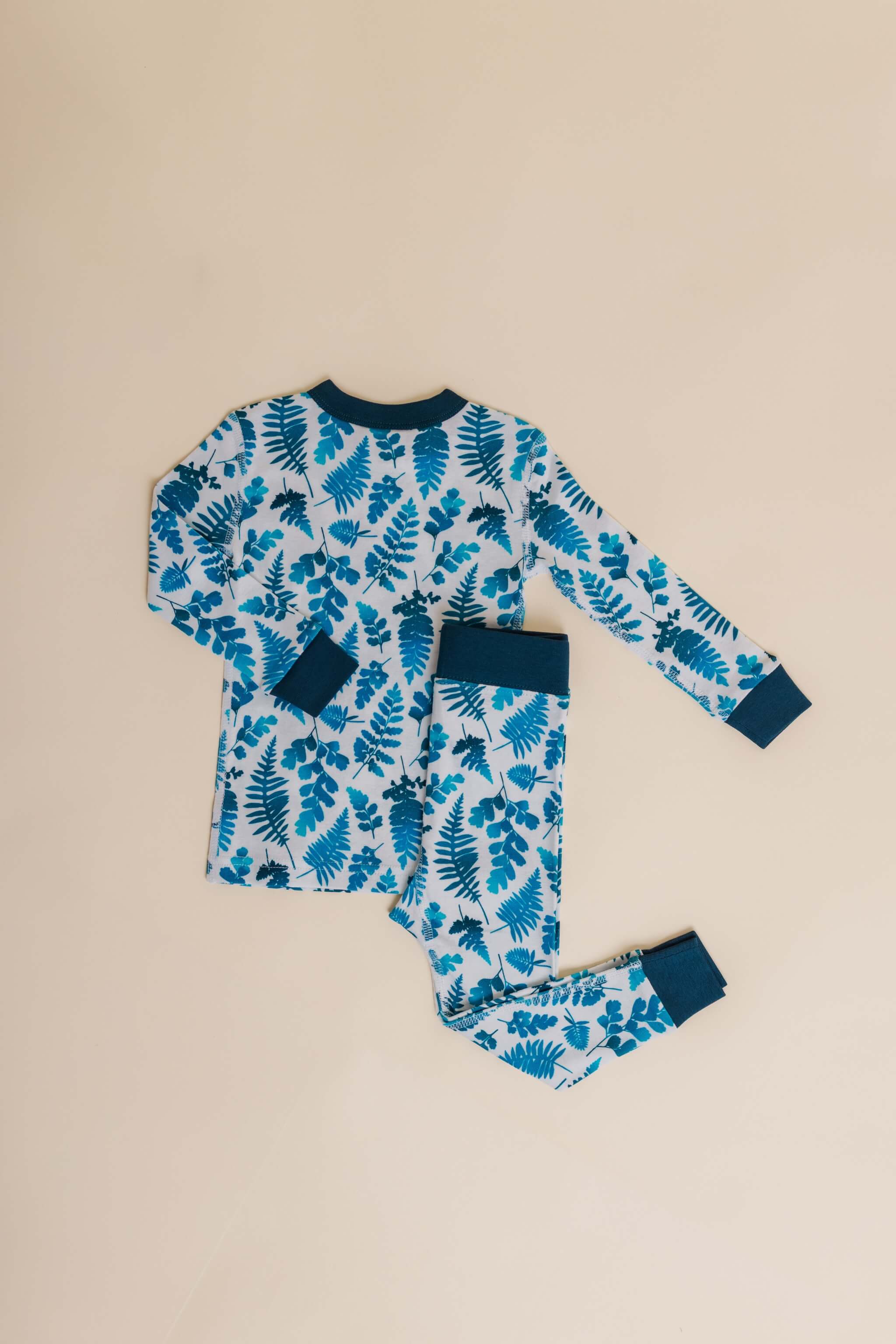 organic cotton children's long sleeve sleepwear in blue fern print designed by jen johnston