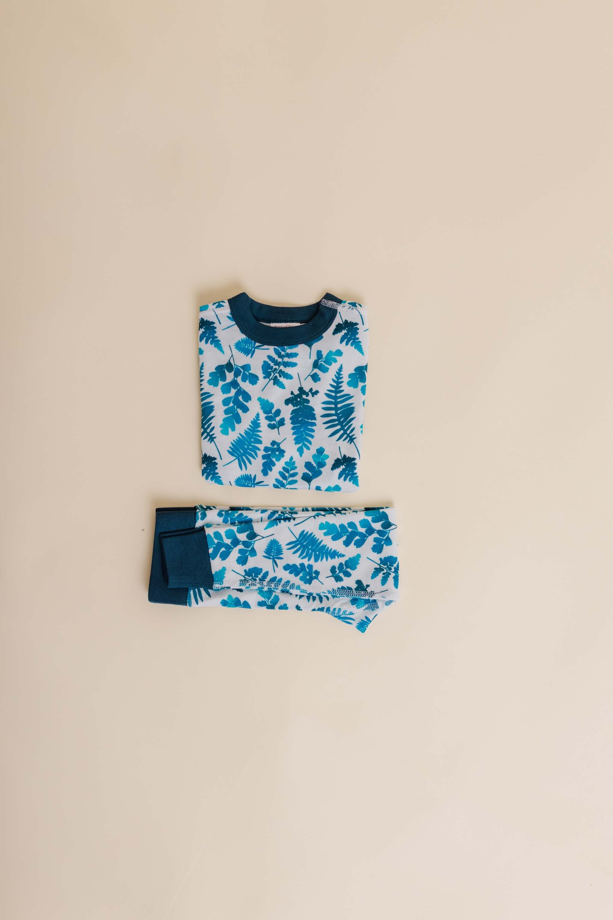 organic cotton children's long sleeve sleepwear in blue fern print designed by jen johnston