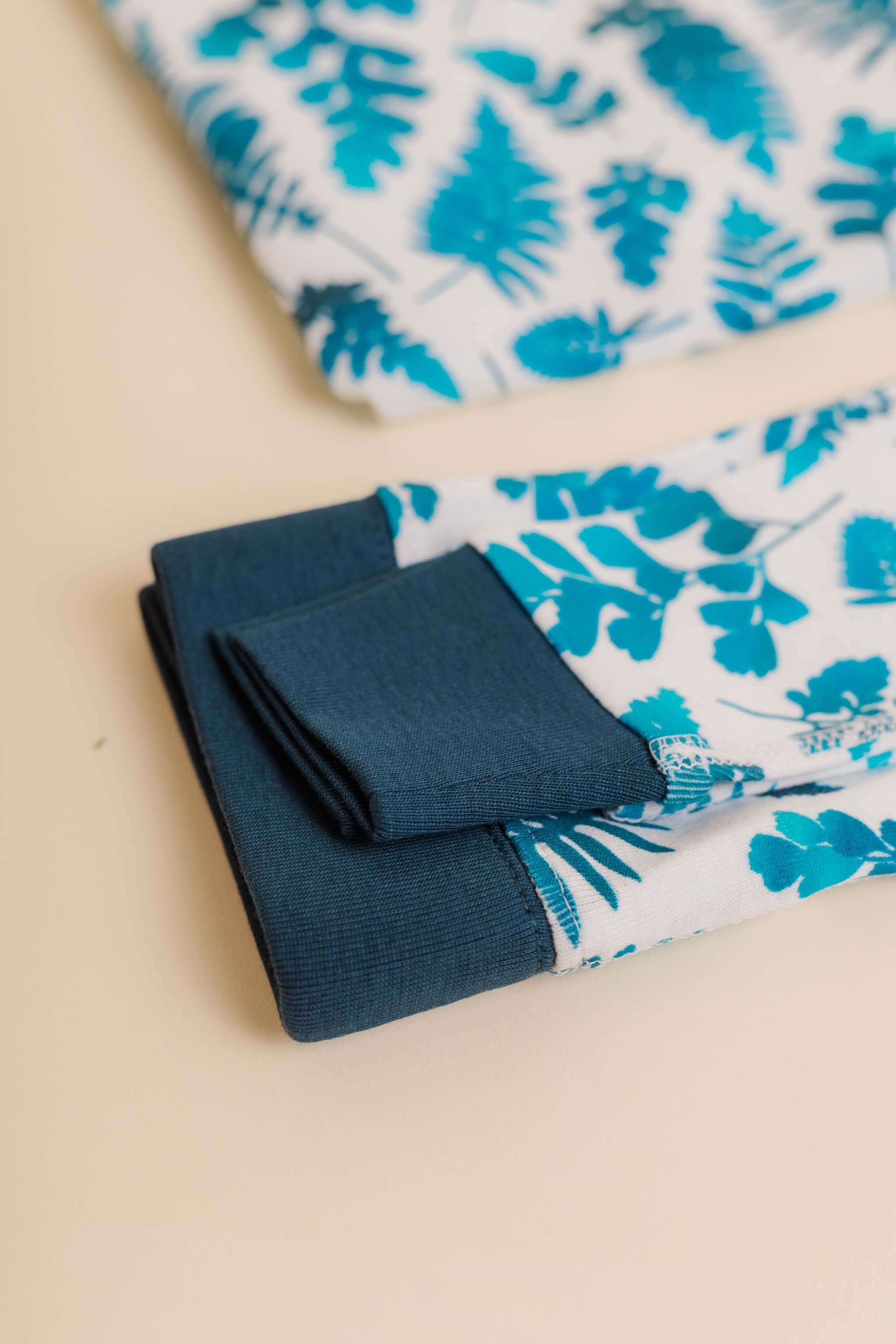 organic cotton children's long sleeve sleepwear in blue fern print designed by jen johnston