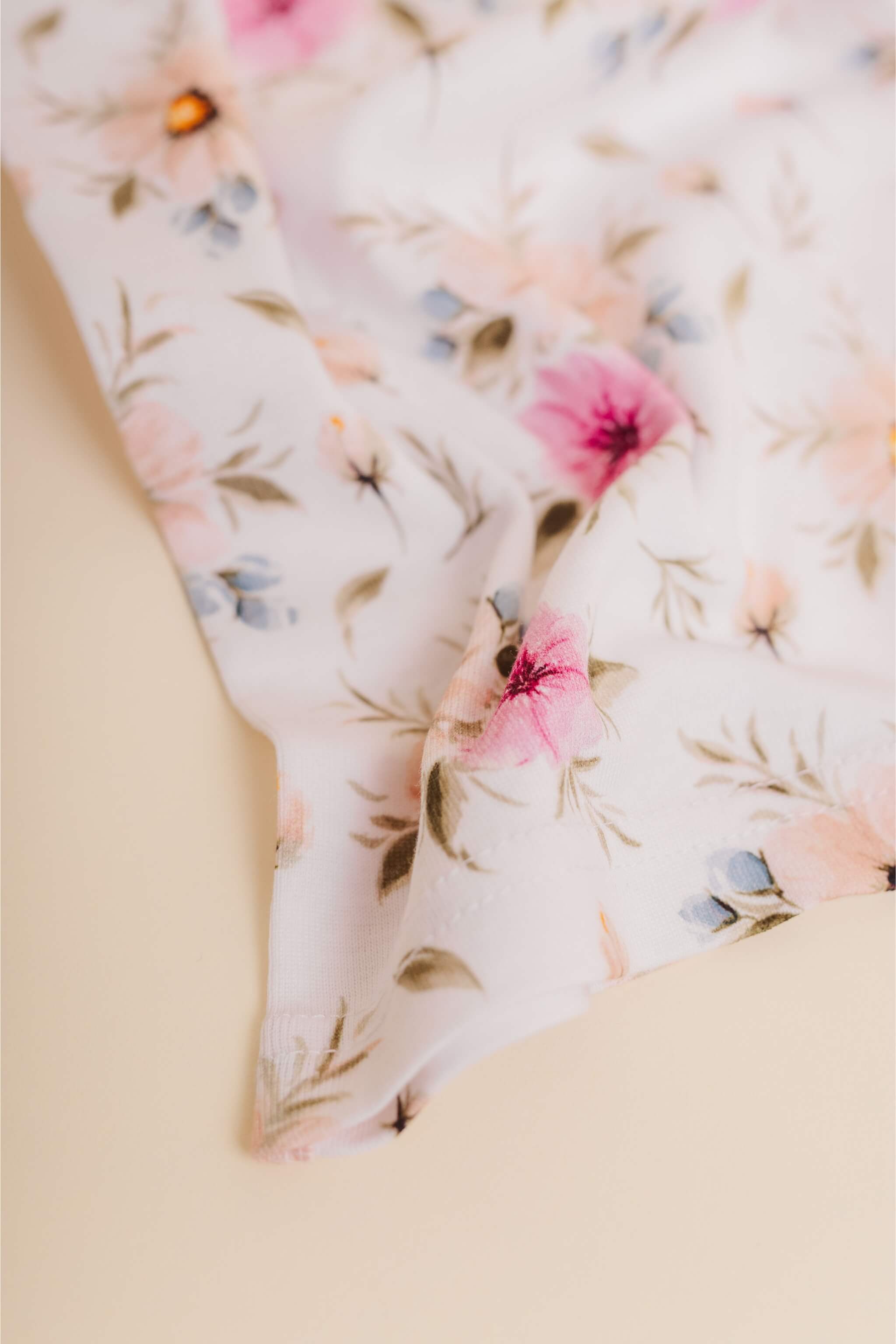 organic cotton children's long sleeve sleepwear in coral floral print designed by jen sweeeney