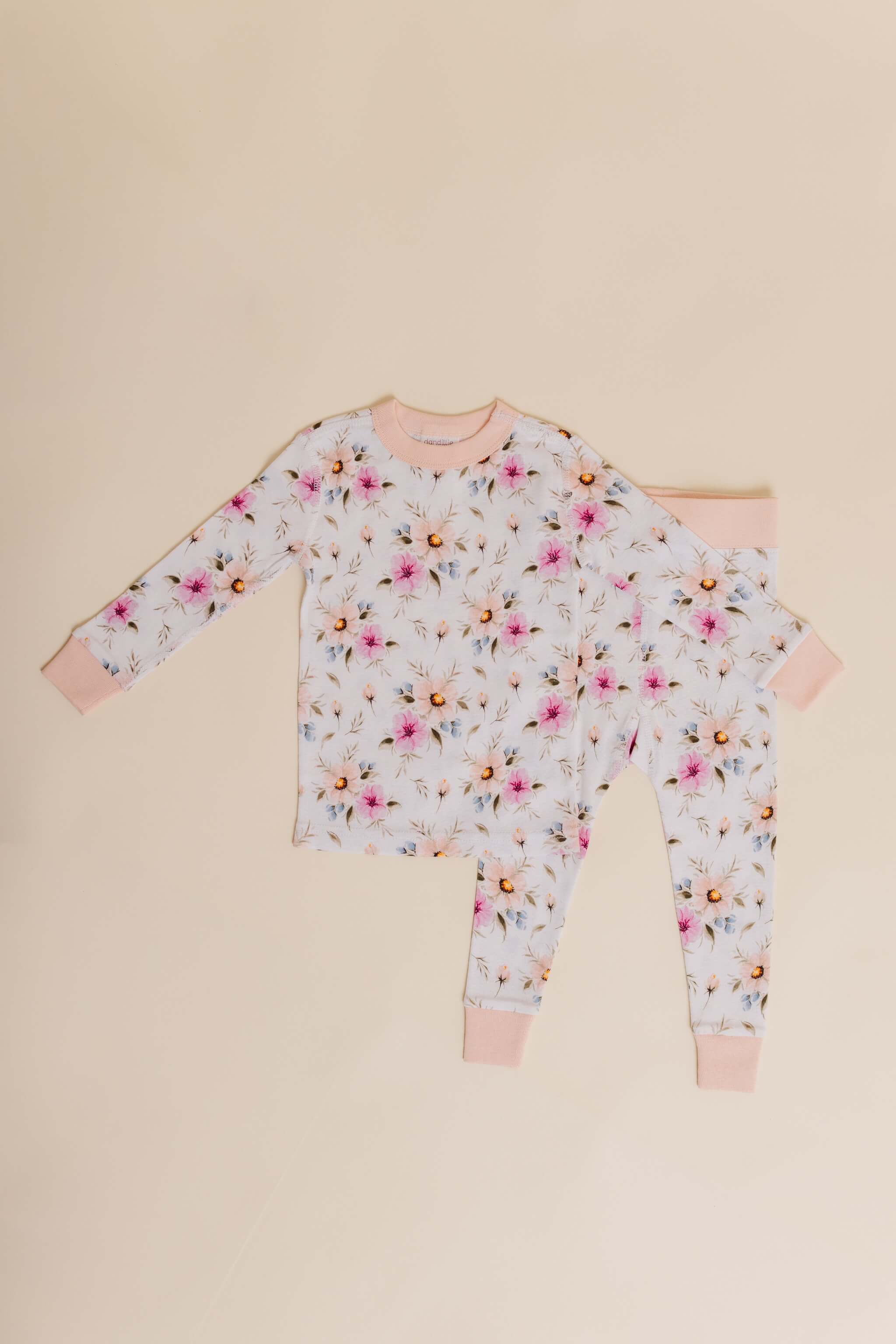 organic cotton children's long sleeve sleepwear in coral floral print designed by jen sweeeney