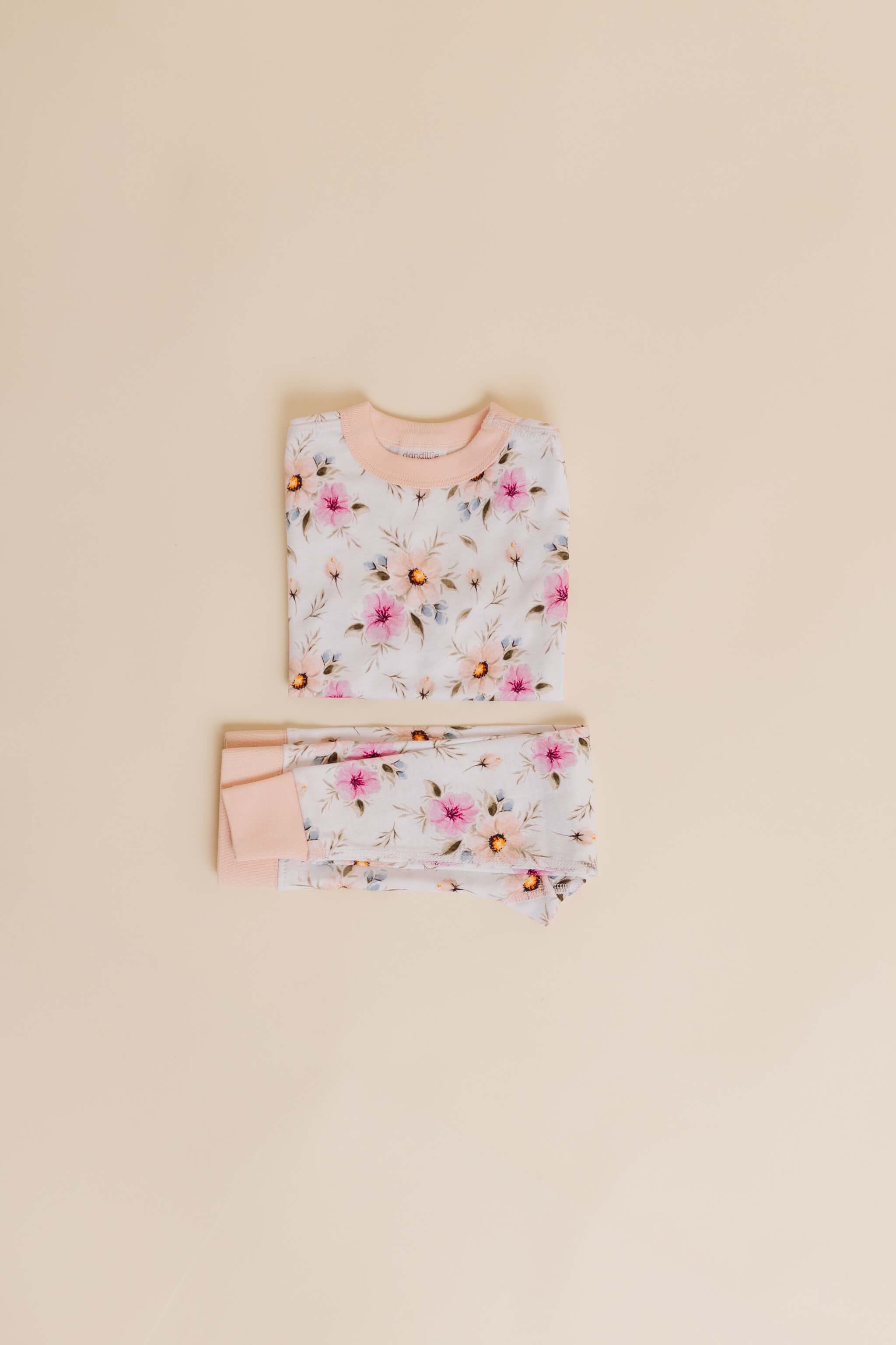 organic cotton children's long sleeve sleepwear in coral floral print designed by jen sweeeney
