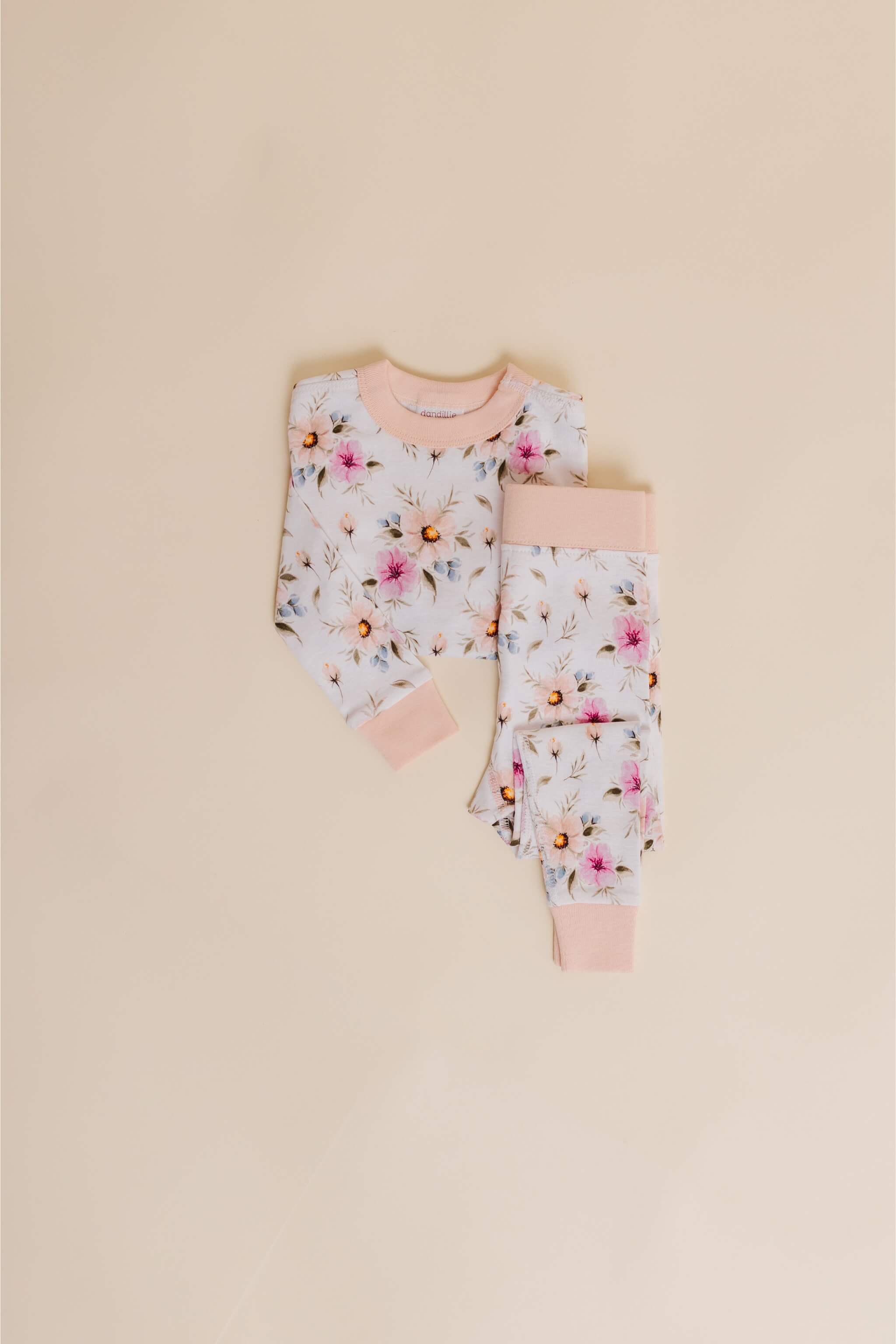 organic cotton children's long sleeve sleepwear in coral floral print designed by jen sweeeney