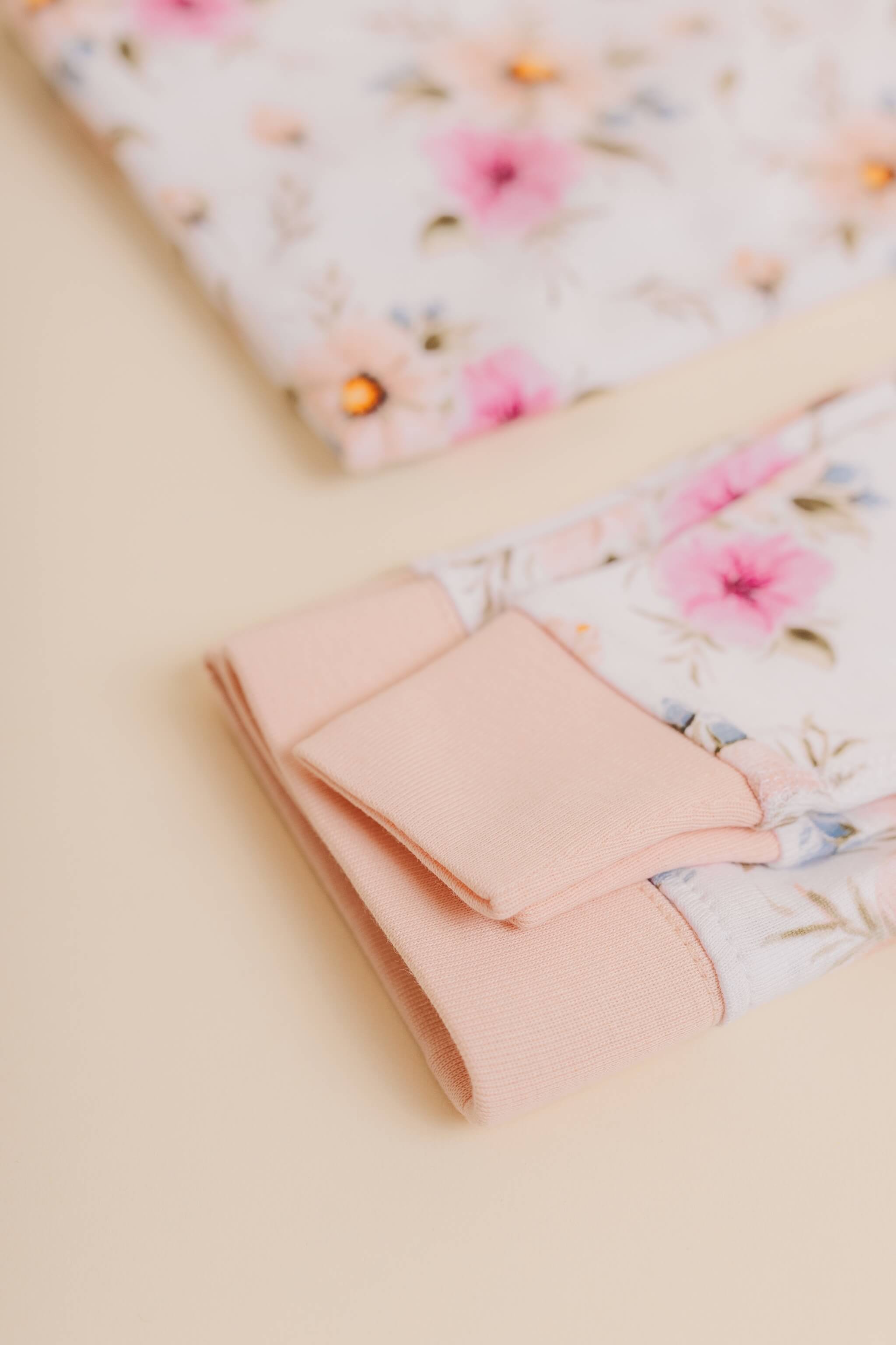 organic cotton children's long sleeve sleepwear in coral floral print designed by jen sweeeney