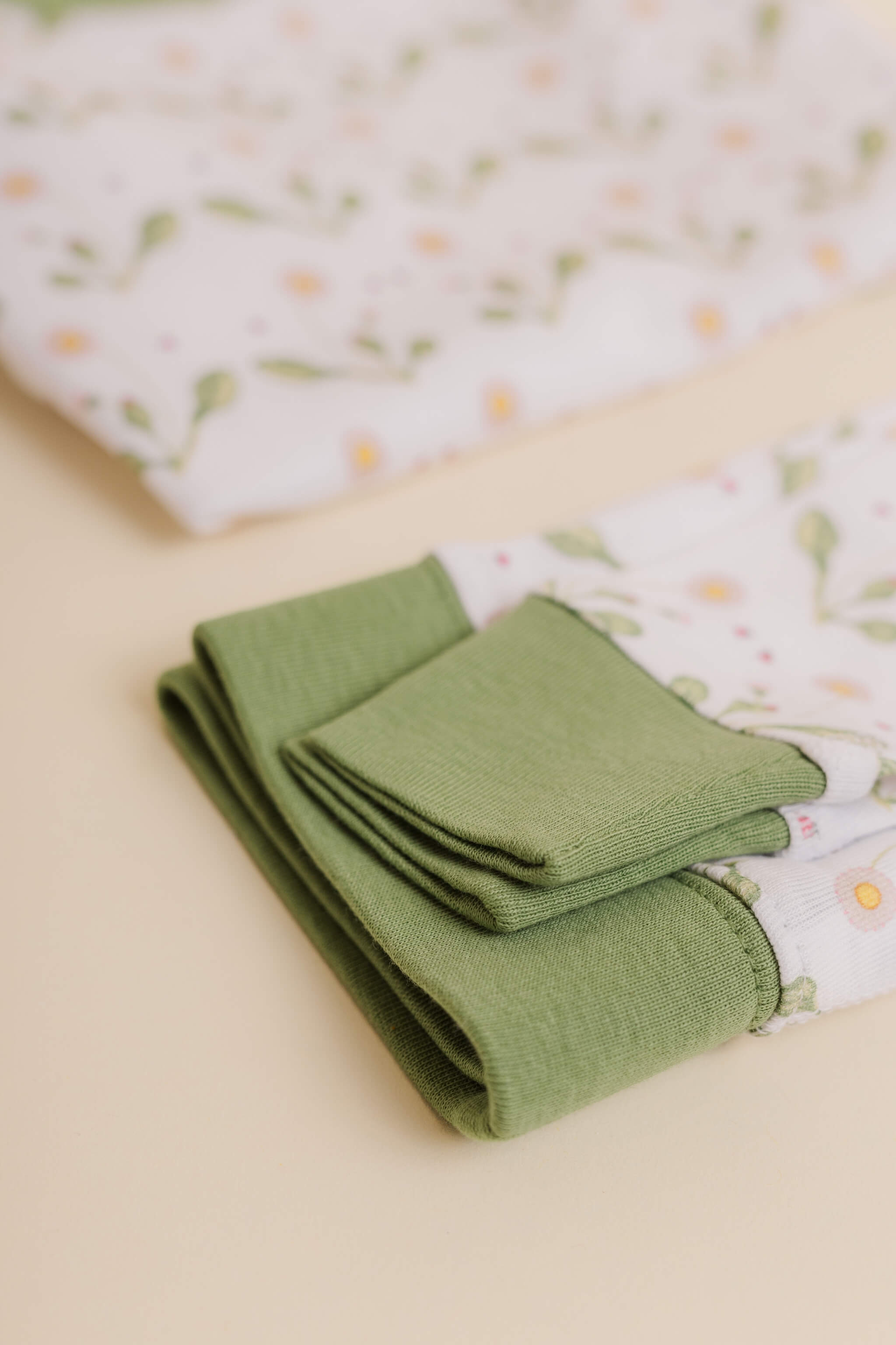 organic cotton children's long sleeve sleepwear in green daisy print designed by giacomina ferillo