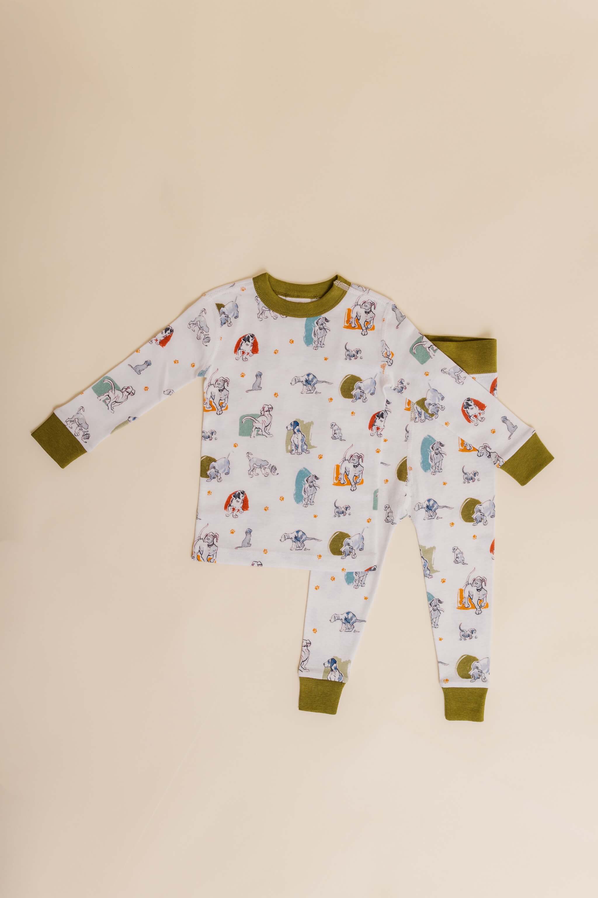organic cotton children's long sleeve sleepwear in green puppy print designed by jen brandon
