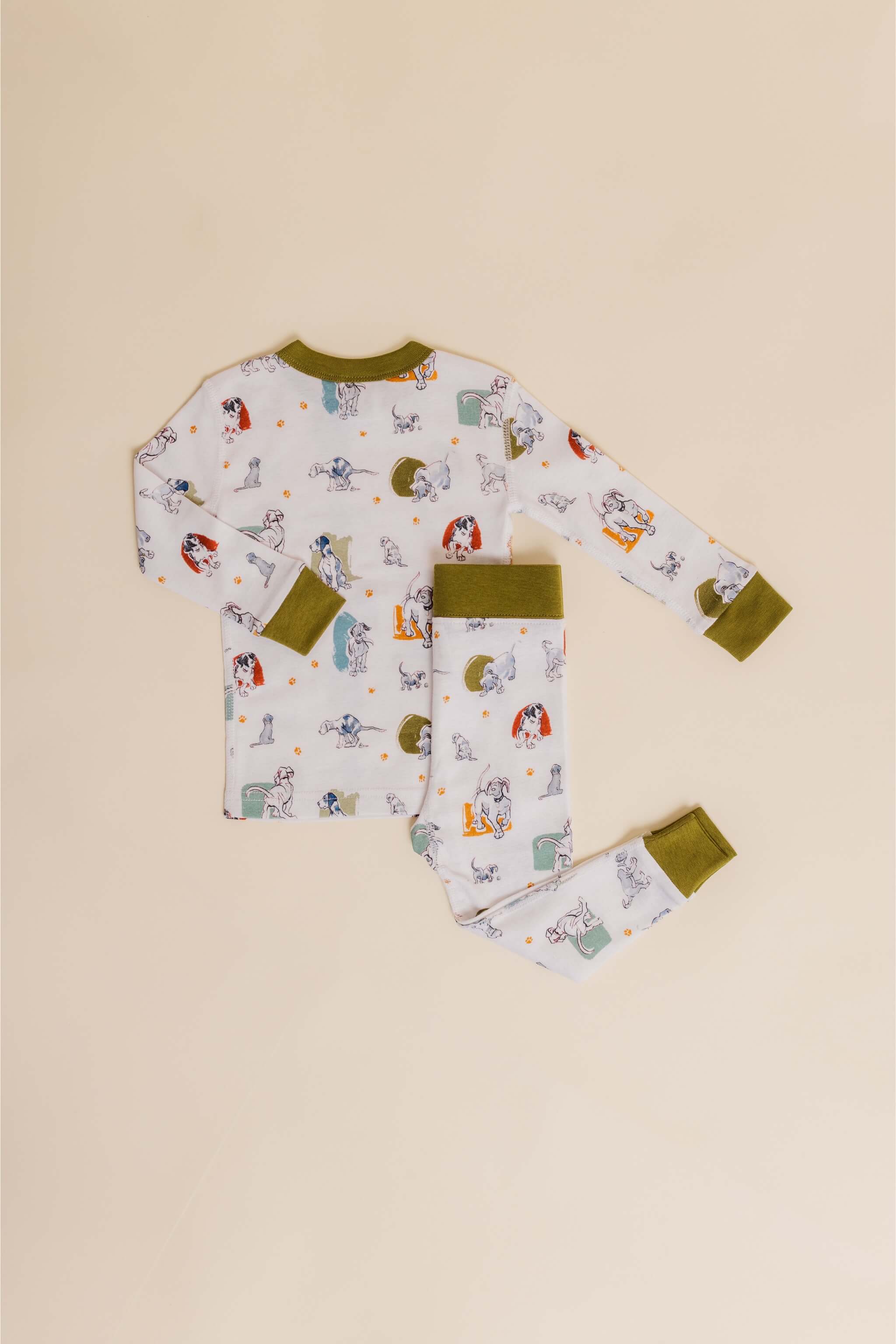 organic cotton children's long sleeve sleepwear in green puppy print designed by jen brandon