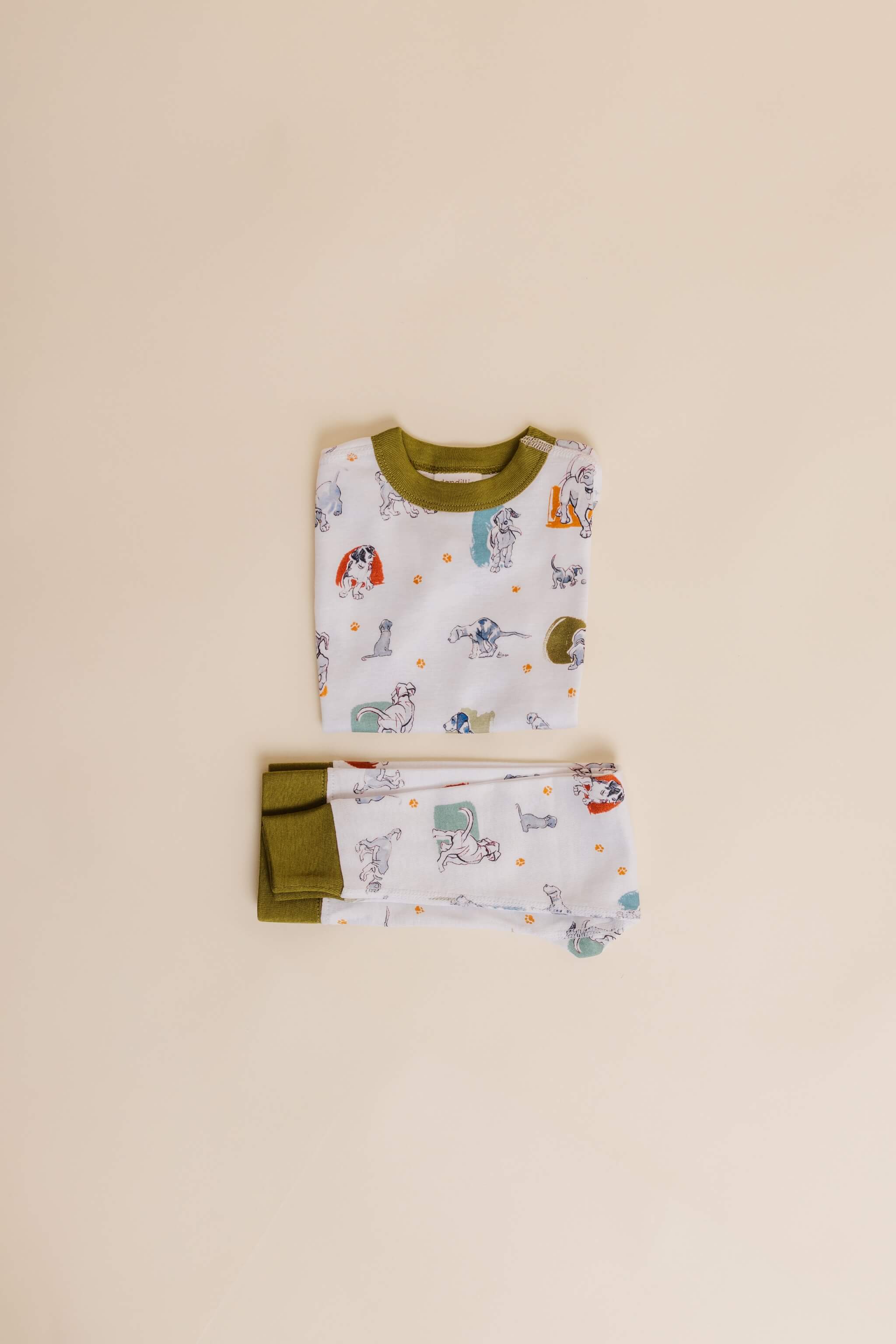 organic cotton children's long sleeve sleepwear in green puppy print designed by jen brandon
