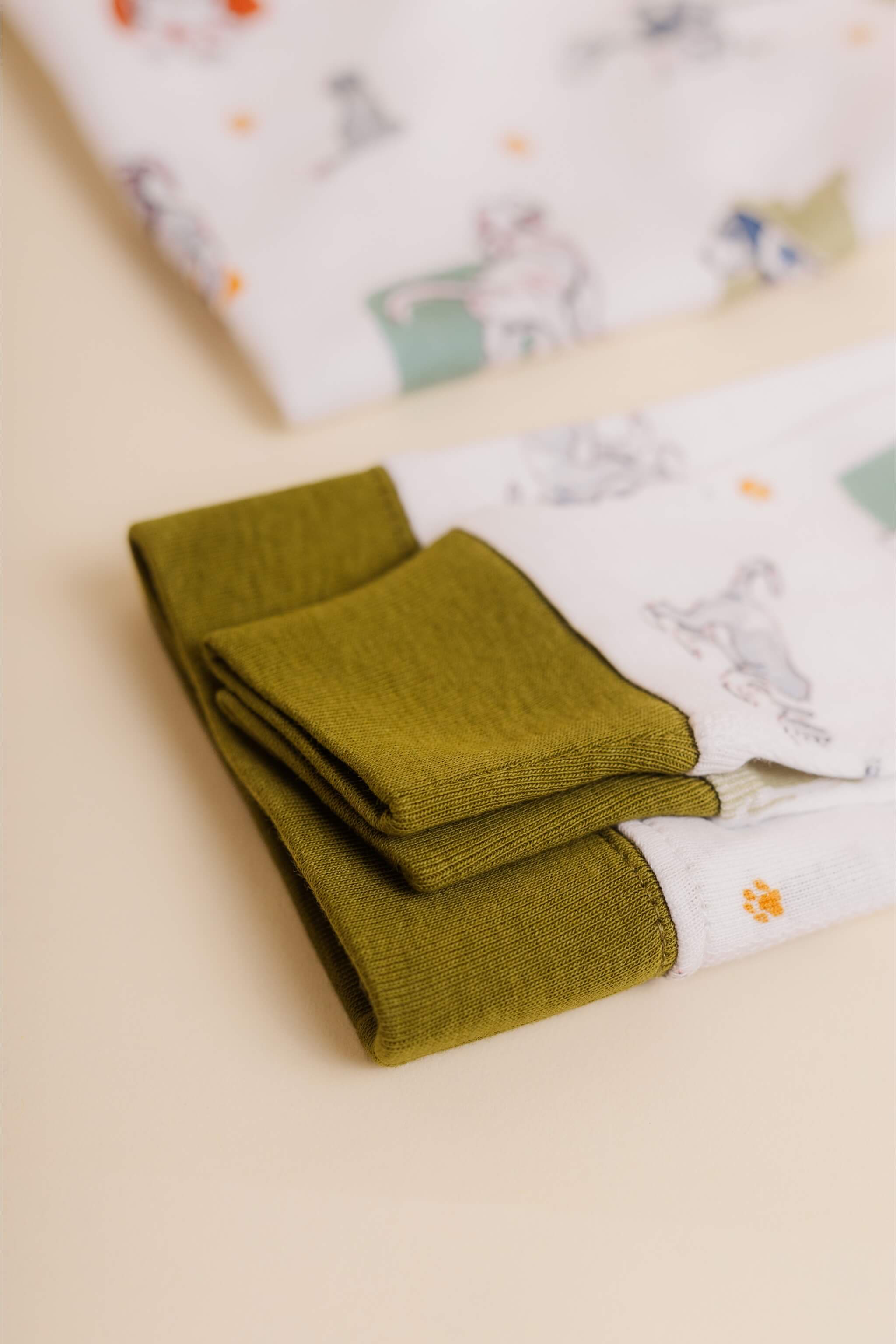 organic cotton children's long sleeve sleepwear in green puppy print designed by jen brandon