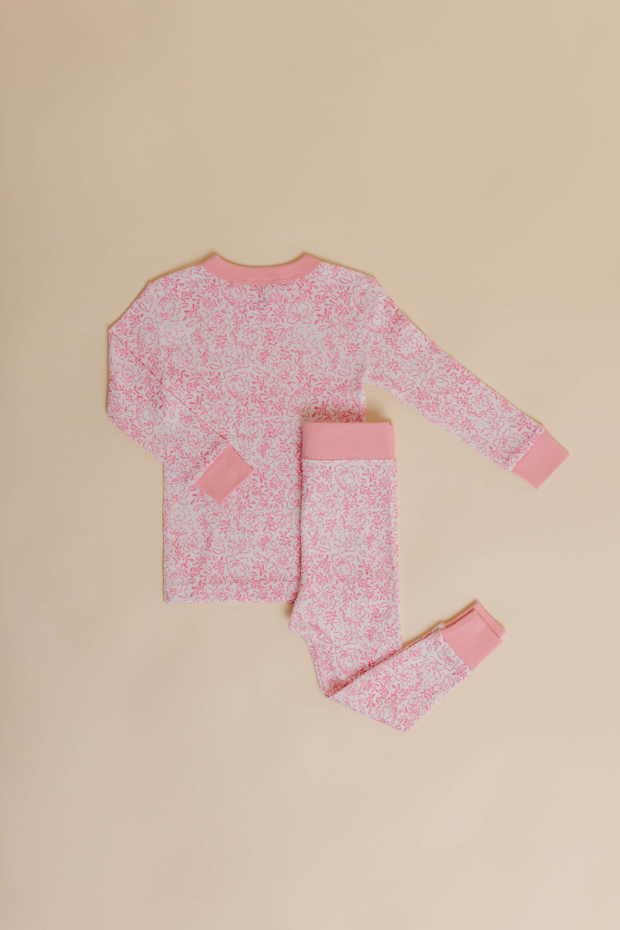 organic cotton children's long sleeve sleepwear in pink floral print designed by eliza baucom