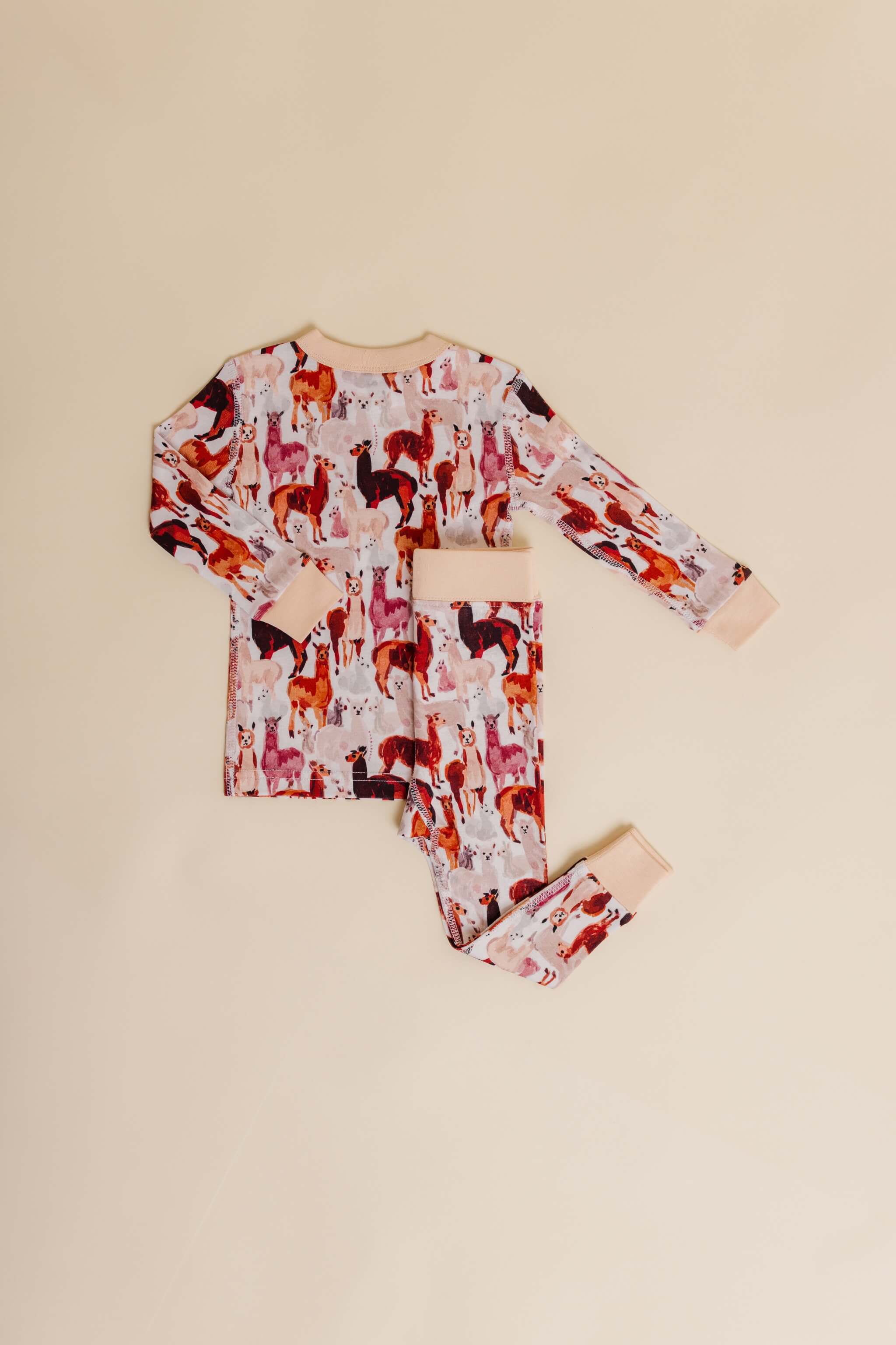 organic cotton children's long sleeve sleepwear in tan alpaca print designed by barbra ignatiev