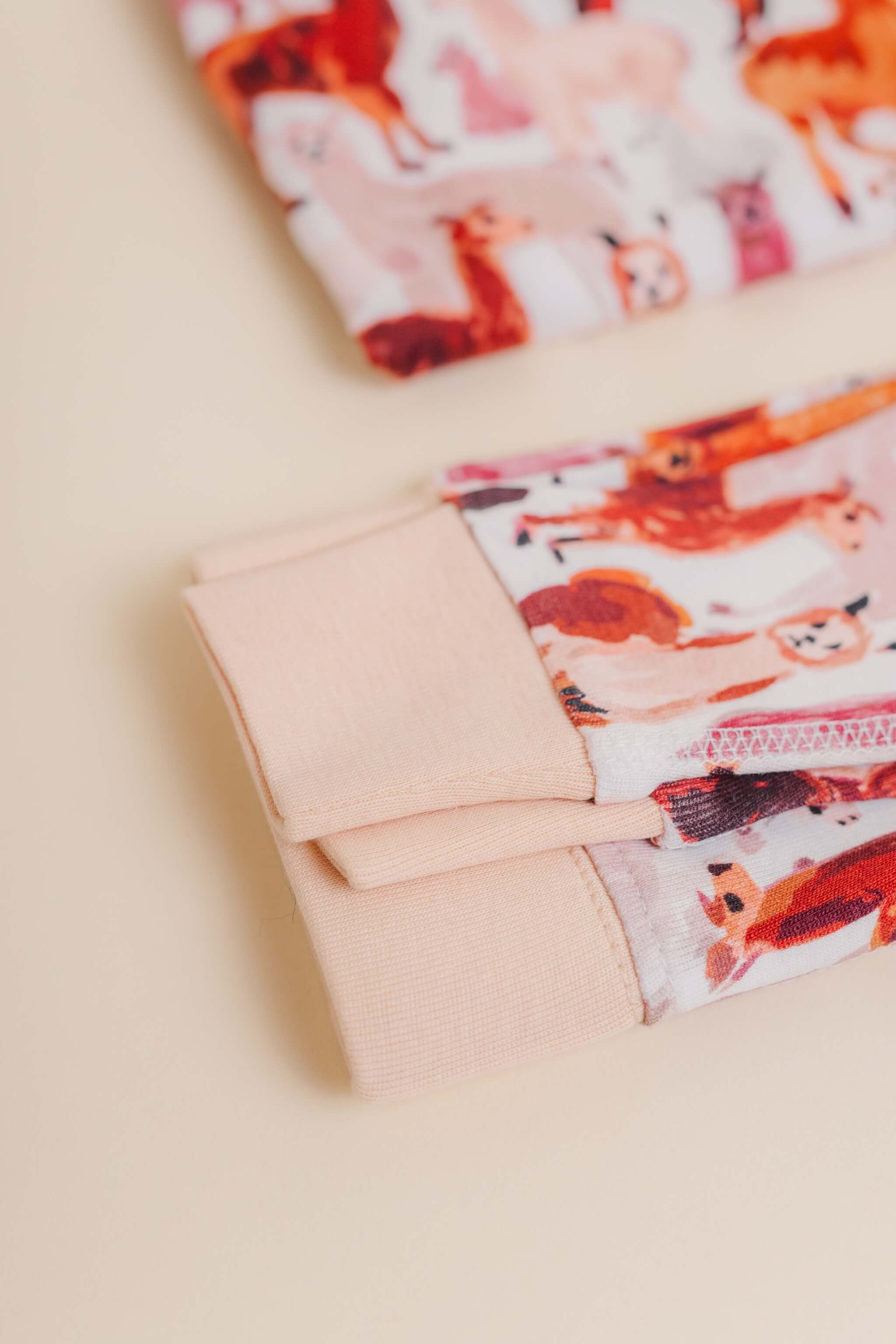 organic cotton children's long sleeve sleepwear in tan alpaca print designed by barbra ignatiev