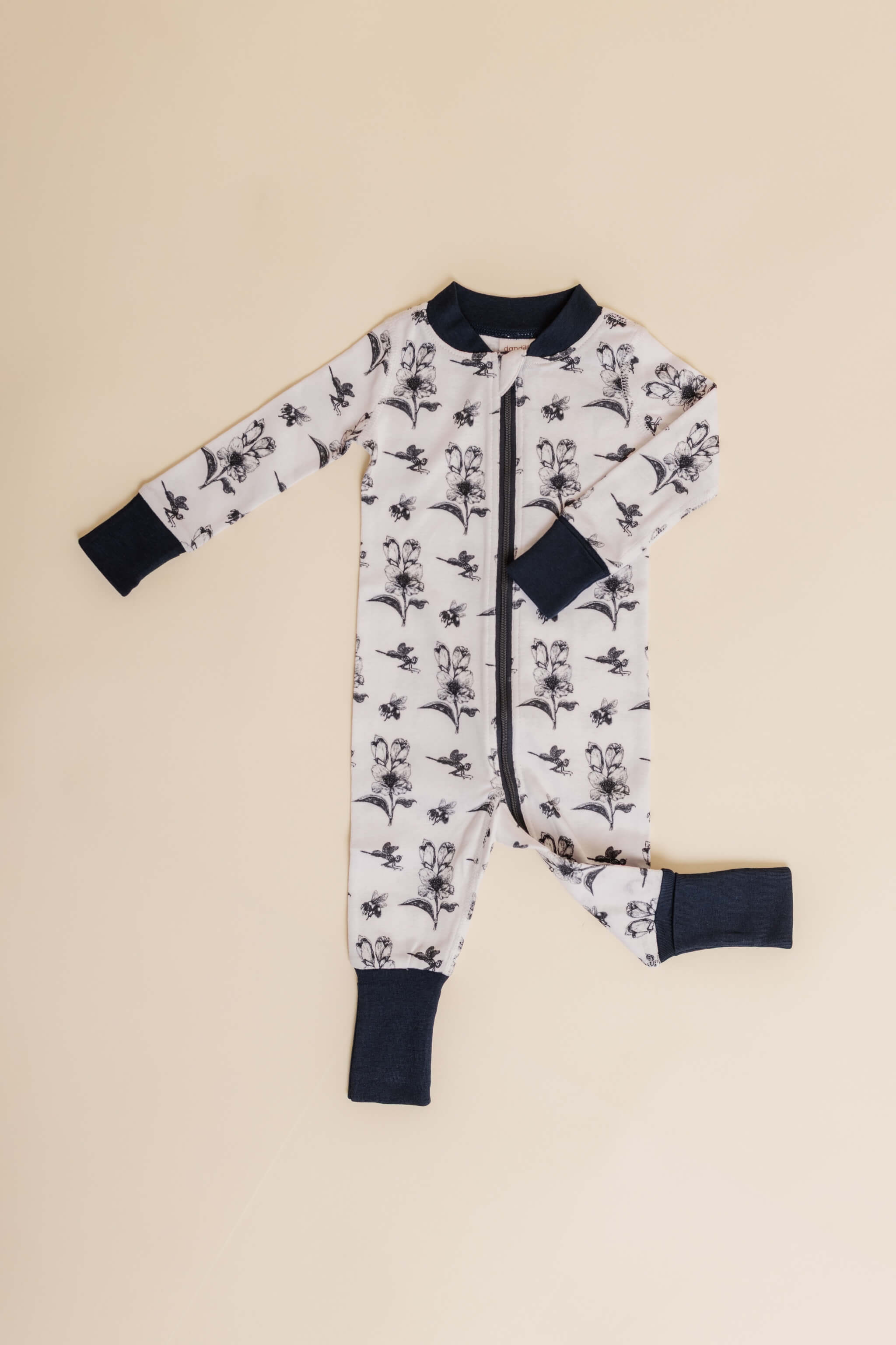 organic cotton baby zipper sleeper with fold-over cuffs in black ink print designed by chewie co