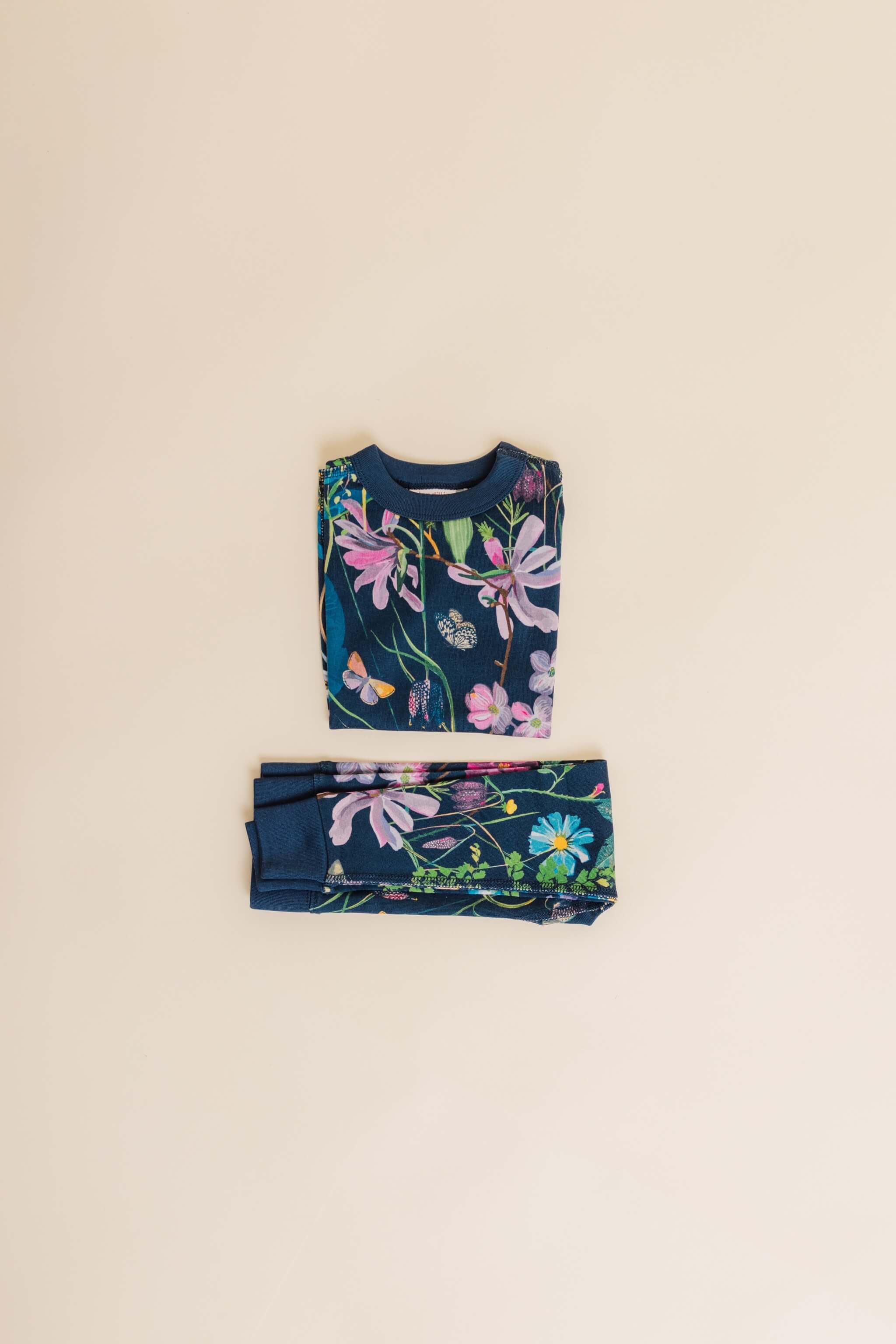 organic cotton children's long sleeve sleepwear in blue floral print designed by julia whitney barnes